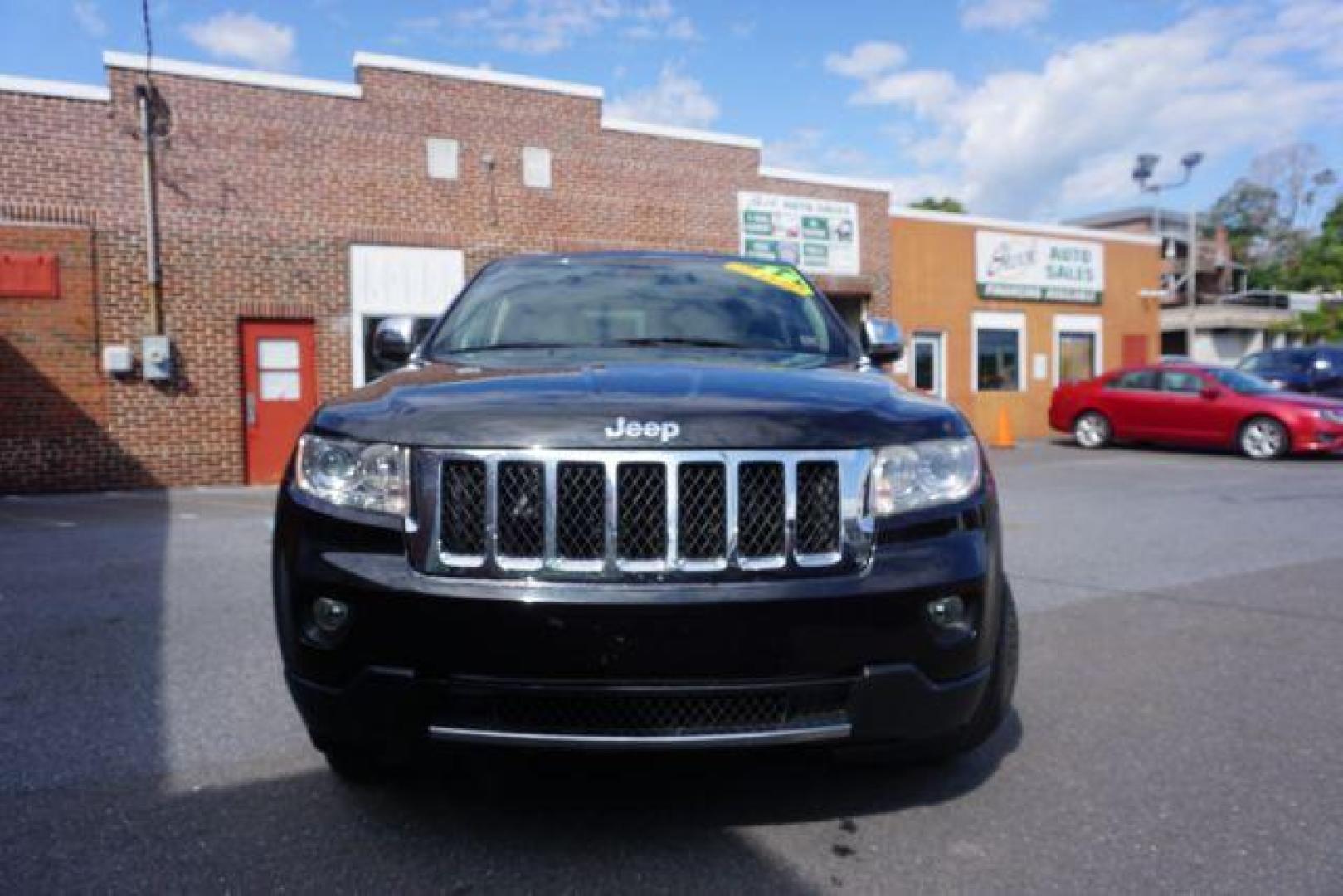 2013 Brilliant Black Crystal Pearl Jeep Grand Cherokee Overland 4WD (1C4RJFCG7DC) with an 3.6L V6 DOHC 24V engine, 5-Speed Automatic transmission, located at 312 Centre Ave, Schuylkill Haven, PA, 17972, (570) 593-5278, 40.638130, -76.177383 - blind spot monitor, collision avoidance system, rear parking sensors, towing pkg - Photo#6