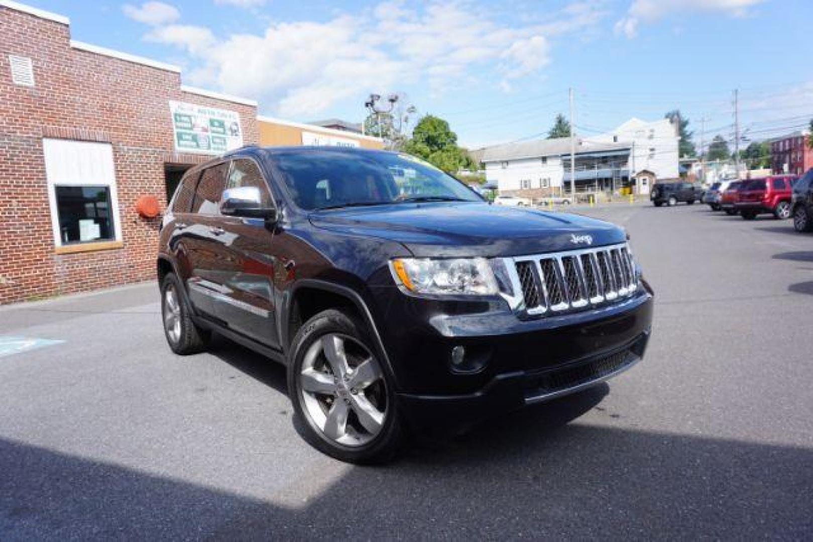 2013 Brilliant Black Crystal Pearl Jeep Grand Cherokee Overland 4WD (1C4RJFCG7DC) with an 3.6L V6 DOHC 24V engine, 5-Speed Automatic transmission, located at 312 Centre Ave, Schuylkill Haven, PA, 17972, (570) 593-5278, 40.638130, -76.177383 - blind spot monitor, collision avoidance system, rear parking sensors, towing pkg - Photo#7