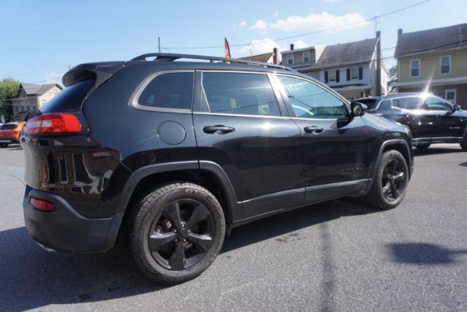 2016 Brilliant Black Crystal Pearl Coat Jeep Cherokee Limited 4WD (1C4PJMDS0GW) with an 3.2L V6 DOHC 24V engine, 9-Speed Automatic transmission, located at 312 Centre Ave, Schuylkill Haven, PA, 17972, (570) 593-5278, 40.638130, -76.177383 - adaptive cruise control, driver's seat memory, HID headlamps, heated exterior mirrors, heated front seats, leather seats, luggage rack, navigation system, passive keyless entry, power driver's seat, power liftgate, power sunroof, rear parking sensors, remote engine starter - Photo#12