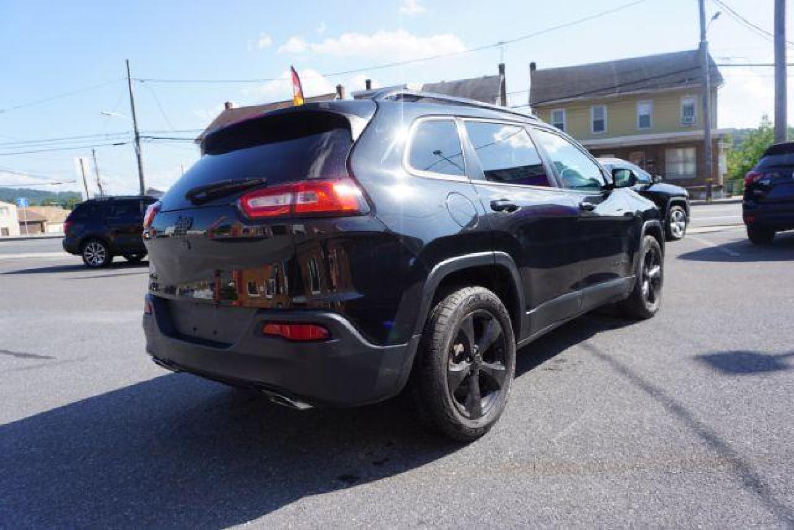 2016 Brilliant Black Crystal Pearl Coat Jeep Cherokee Limited 4WD (1C4PJMDS0GW) with an 3.2L V6 DOHC 24V engine, 9-Speed Automatic transmission, located at 312 Centre Ave, Schuylkill Haven, PA, 17972, (570) 593-5278, 40.638130, -76.177383 - adaptive cruise control, driver's seat memory, HID headlamps, heated exterior mirrors, heated front seats, leather seats, luggage rack, navigation system, passive keyless entry, power driver's seat, power liftgate, power sunroof, rear parking sensors, remote engine starter - Photo#13