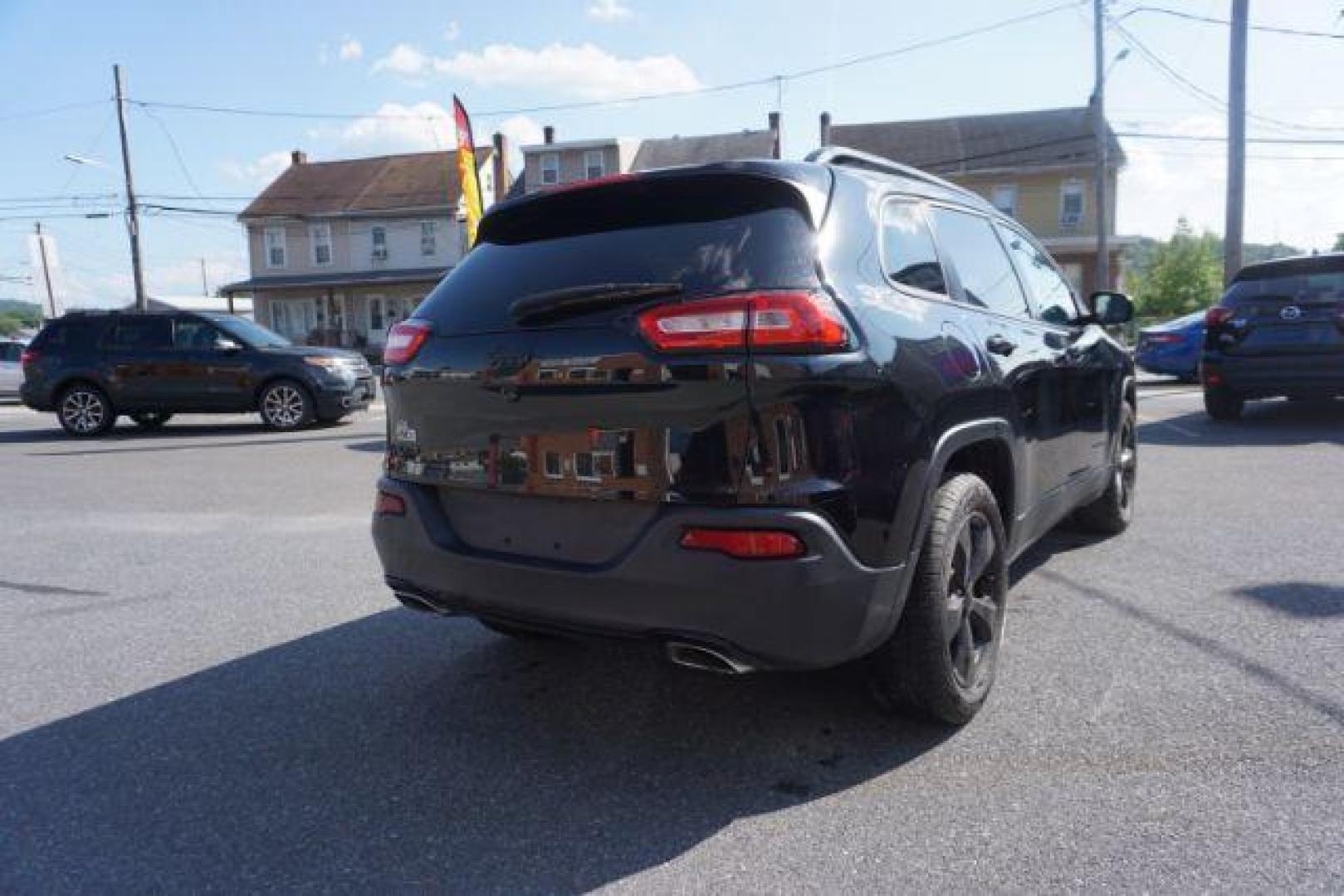 2016 Brilliant Black Crystal Pearl Coat Jeep Cherokee Limited 4WD (1C4PJMDS0GW) with an 3.2L V6 DOHC 24V engine, 9-Speed Automatic transmission, located at 312 Centre Ave, Schuylkill Haven, PA, 17972, (570) 593-5278, 40.638130, -76.177383 - adaptive cruise control, driver's seat memory, HID headlamps, heated exterior mirrors, heated front seats, leather seats, luggage rack, navigation system, passive keyless entry, power driver's seat, power liftgate, power sunroof, rear parking sensors, remote engine starter - Photo#14