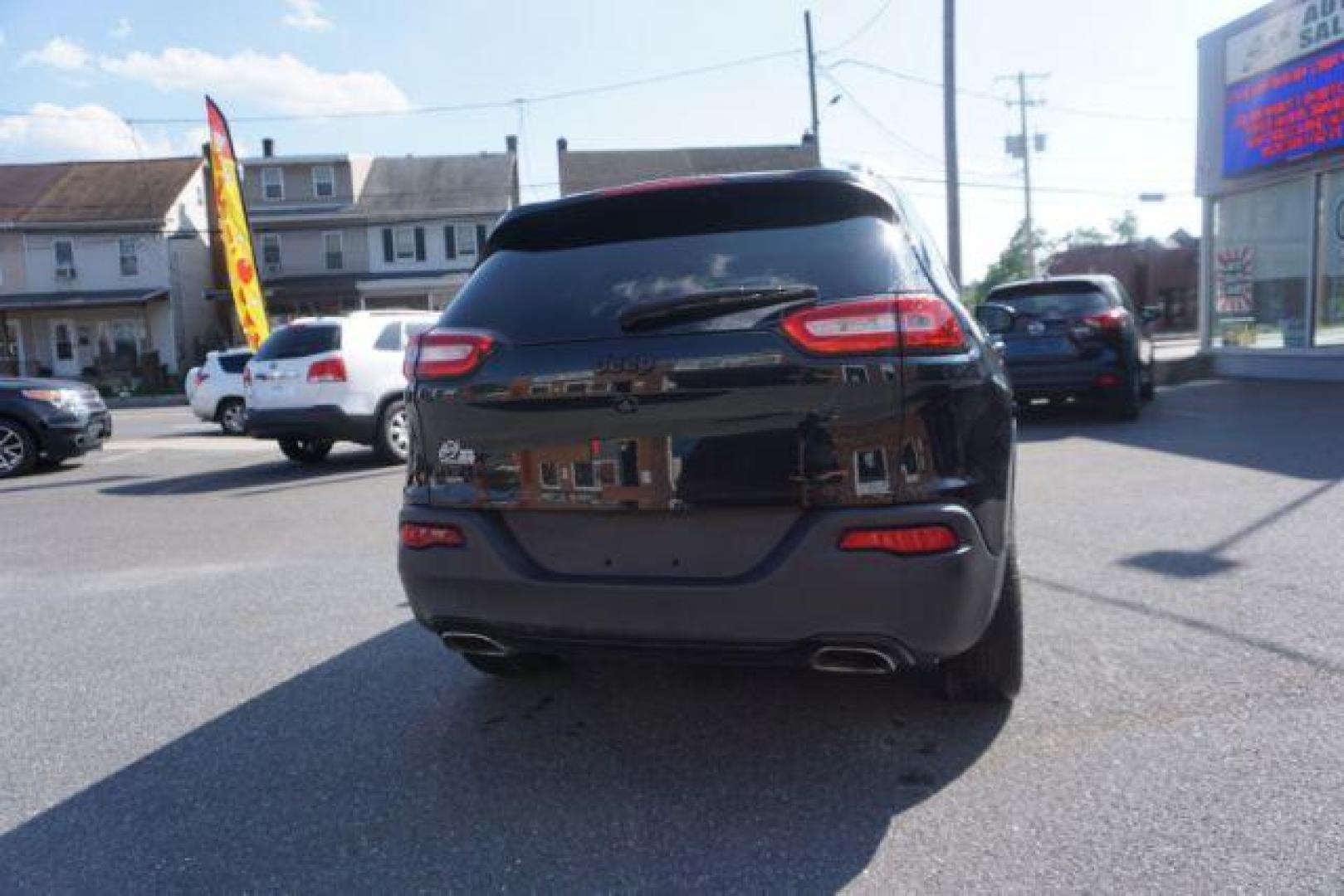 2016 Brilliant Black Crystal Pearl Coat Jeep Cherokee Limited 4WD (1C4PJMDS0GW) with an 3.2L V6 DOHC 24V engine, 9-Speed Automatic transmission, located at 312 Centre Ave, Schuylkill Haven, PA, 17972, (570) 593-5278, 40.638130, -76.177383 - adaptive cruise control, driver's seat memory, HID headlamps, heated exterior mirrors, heated front seats, leather seats, luggage rack, navigation system, passive keyless entry, power driver's seat, power liftgate, power sunroof, rear parking sensors, remote engine starter - Photo#15