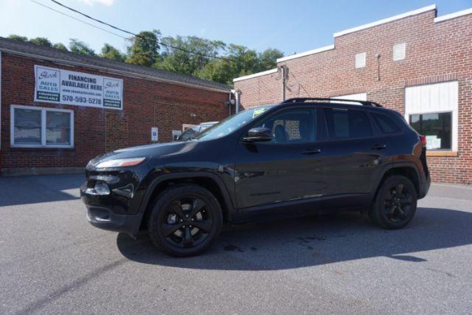 2016 Brilliant Black Crystal Pearl Coat Jeep Cherokee Limited 4WD (1C4PJMDS0GW) with an 3.2L V6 DOHC 24V engine, 9-Speed Automatic transmission, located at 312 Centre Ave, Schuylkill Haven, PA, 17972, (570) 593-5278, 40.638130, -76.177383 - adaptive cruise control, driver's seat memory, HID headlamps, heated exterior mirrors, heated front seats, leather seats, luggage rack, navigation system, passive keyless entry, power driver's seat, power liftgate, power sunroof, rear parking sensors, remote engine starter - Photo#1