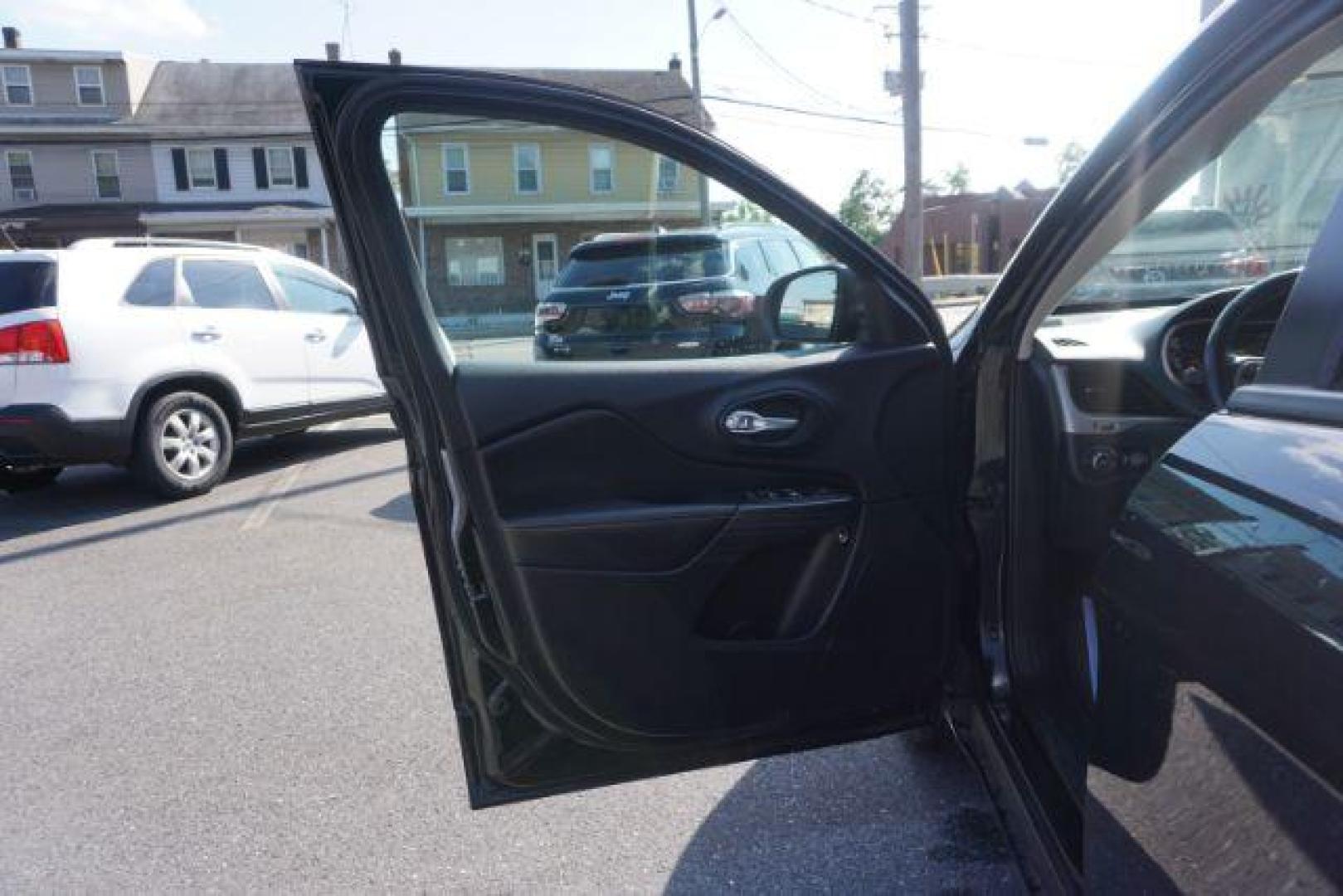 2016 Brilliant Black Crystal Pearl Coat Jeep Cherokee Limited 4WD (1C4PJMDS0GW) with an 3.2L V6 DOHC 24V engine, 9-Speed Automatic transmission, located at 312 Centre Ave, Schuylkill Haven, PA, 17972, (570) 593-5278, 40.638130, -76.177383 - adaptive cruise control, driver's seat memory, HID headlamps, heated exterior mirrors, heated front seats, leather seats, luggage rack, navigation system, passive keyless entry, power driver's seat, power liftgate, power sunroof, rear parking sensors, remote engine starter - Photo#21