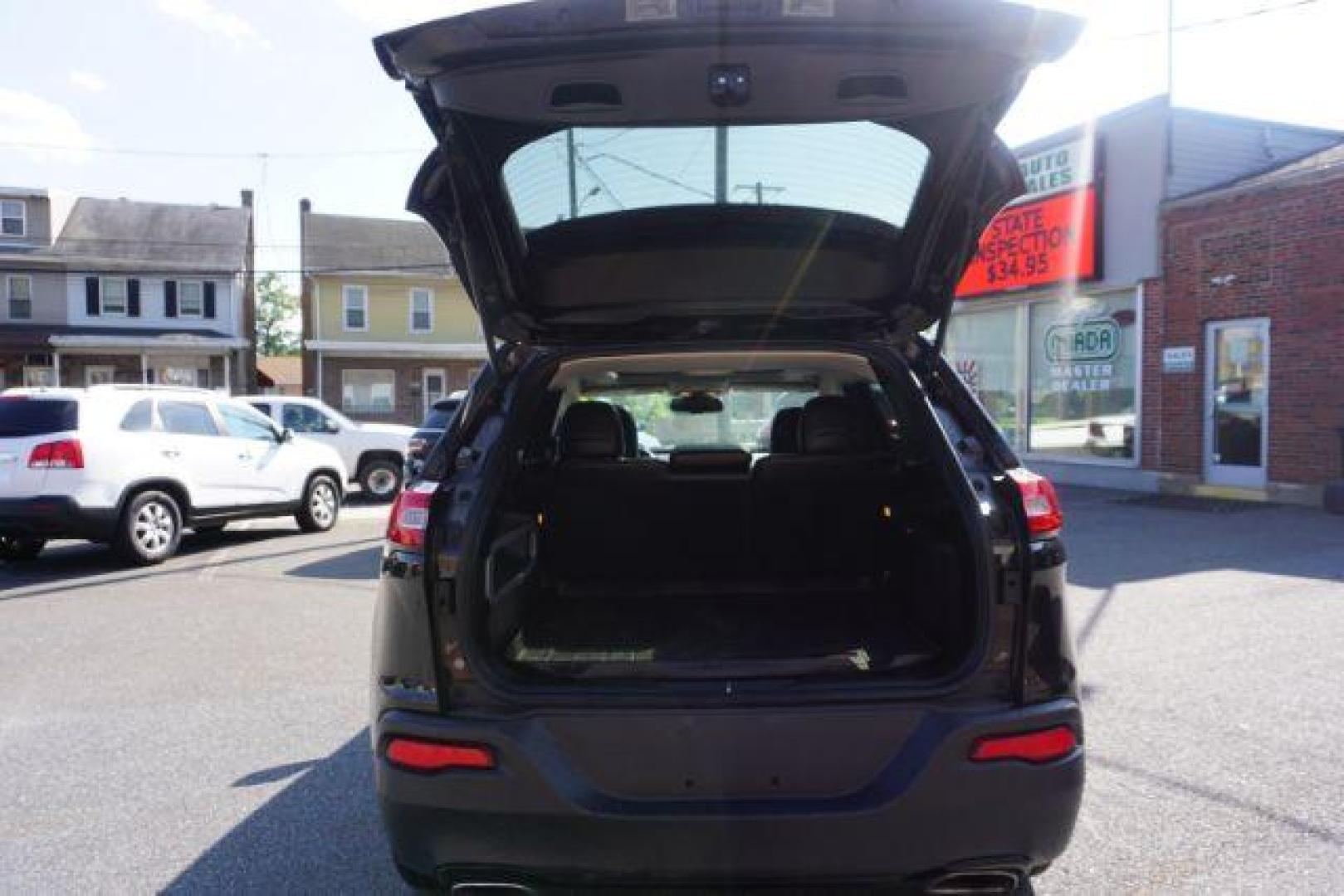 2016 Brilliant Black Crystal Pearl Coat Jeep Cherokee Limited 4WD (1C4PJMDS0GW) with an 3.2L V6 DOHC 24V engine, 9-Speed Automatic transmission, located at 312 Centre Ave, Schuylkill Haven, PA, 17972, (570) 593-5278, 40.638130, -76.177383 - adaptive cruise control, driver's seat memory, HID headlamps, heated exterior mirrors, heated front seats, leather seats, luggage rack, navigation system, passive keyless entry, power driver's seat, power liftgate, power sunroof, rear parking sensors, remote engine starter - Photo#49