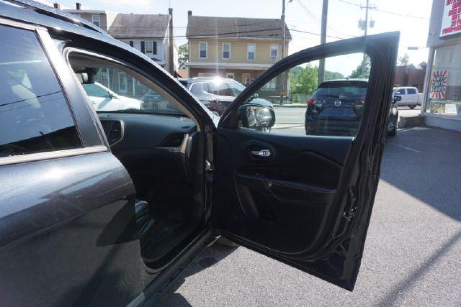 2016 Brilliant Black Crystal Pearl Coat Jeep Cherokee Limited 4WD (1C4PJMDS0GW) with an 3.2L V6 DOHC 24V engine, 9-Speed Automatic transmission, located at 312 Centre Ave, Schuylkill Haven, PA, 17972, (570) 593-5278, 40.638130, -76.177383 - adaptive cruise control, driver's seat memory, HID headlamps, heated exterior mirrors, heated front seats, leather seats, luggage rack, navigation system, passive keyless entry, power driver's seat, power liftgate, power sunroof, rear parking sensors, remote engine starter - Photo#56