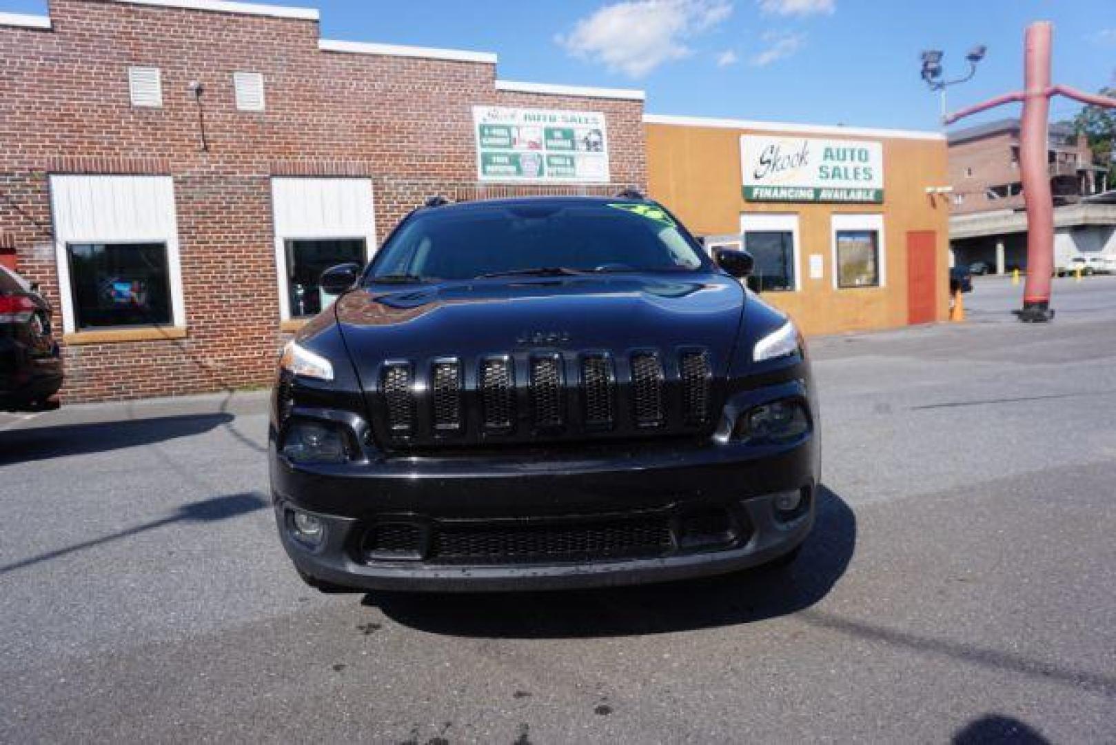 2016 Brilliant Black Crystal Pearl Coat Jeep Cherokee Limited 4WD (1C4PJMDS0GW) with an 3.2L V6 DOHC 24V engine, 9-Speed Automatic transmission, located at 312 Centre Ave, Schuylkill Haven, PA, 17972, (570) 593-5278, 40.638130, -76.177383 - adaptive cruise control, driver's seat memory, HID headlamps, heated exterior mirrors, heated front seats, leather seats, luggage rack, navigation system, passive keyless entry, power driver's seat, power liftgate, power sunroof, rear parking sensors, remote engine starter - Photo#6