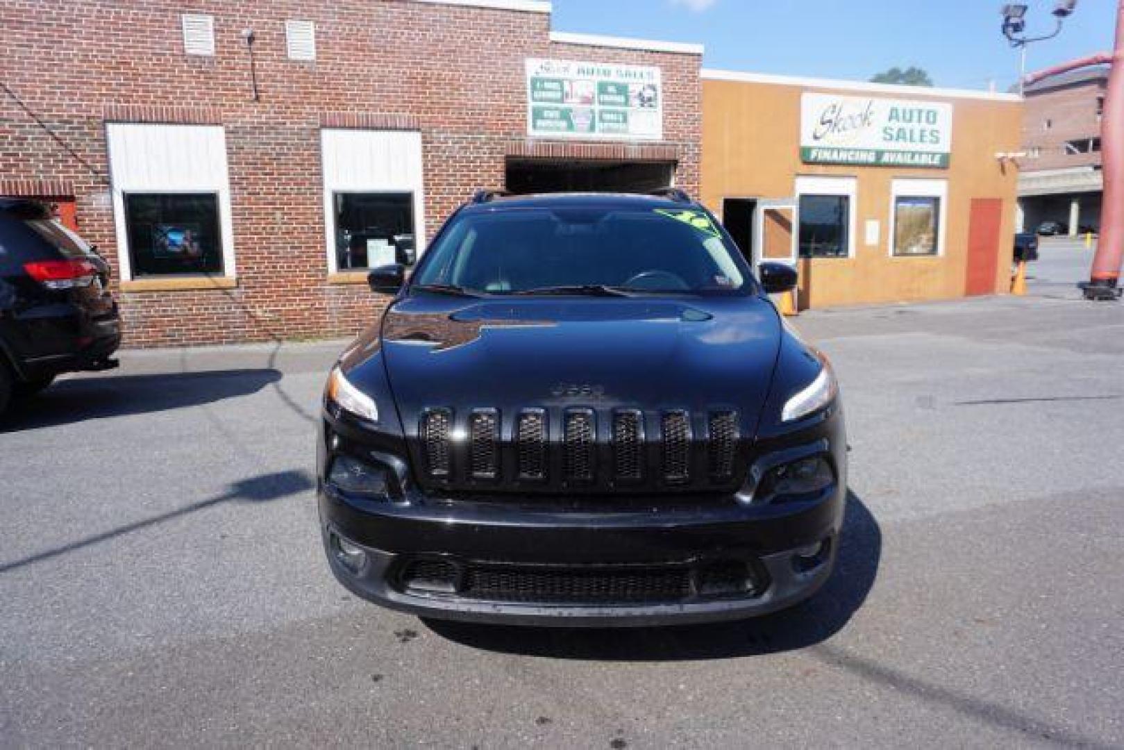 2016 Brilliant Black Crystal Pearl Coat Jeep Cherokee Limited 4WD (1C4PJMDS0GW) with an 3.2L V6 DOHC 24V engine, 9-Speed Automatic transmission, located at 312 Centre Ave, Schuylkill Haven, PA, 17972, (570) 593-5278, 40.638130, -76.177383 - adaptive cruise control, driver's seat memory, HID headlamps, heated exterior mirrors, heated front seats, leather seats, luggage rack, navigation system, passive keyless entry, power driver's seat, power liftgate, power sunroof, rear parking sensors, remote engine starter - Photo#7