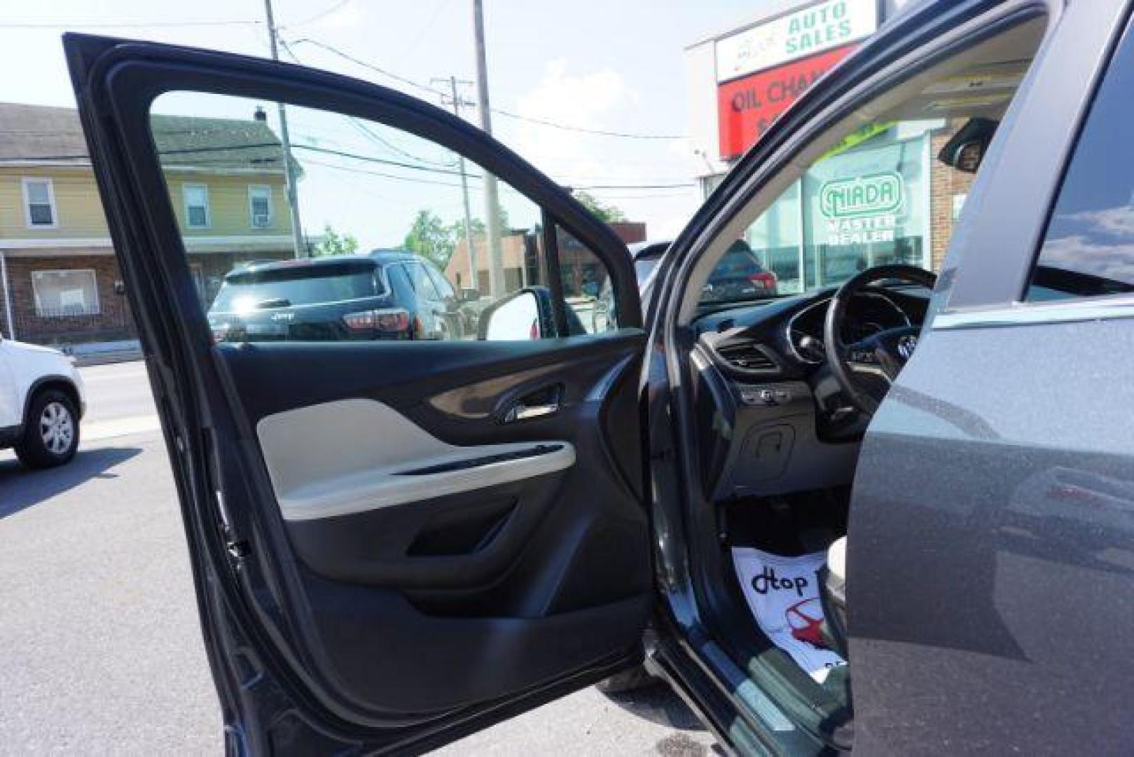 2018 Graphite Gray Metallic/Black Carbon Metallic /Shale Seats w/Ebony Accents, leather Buick Encore Essence AWD (KL4CJGSB1JB) with an 1.4L L4 DOHC 16V TURBO engine, 6-Speed Automatic transmission, located at 312 Centre Ave, Schuylkill Haven, PA, 17972, (570) 593-5278, 40.638130, -76.177383 - luggage rack - Photo#20