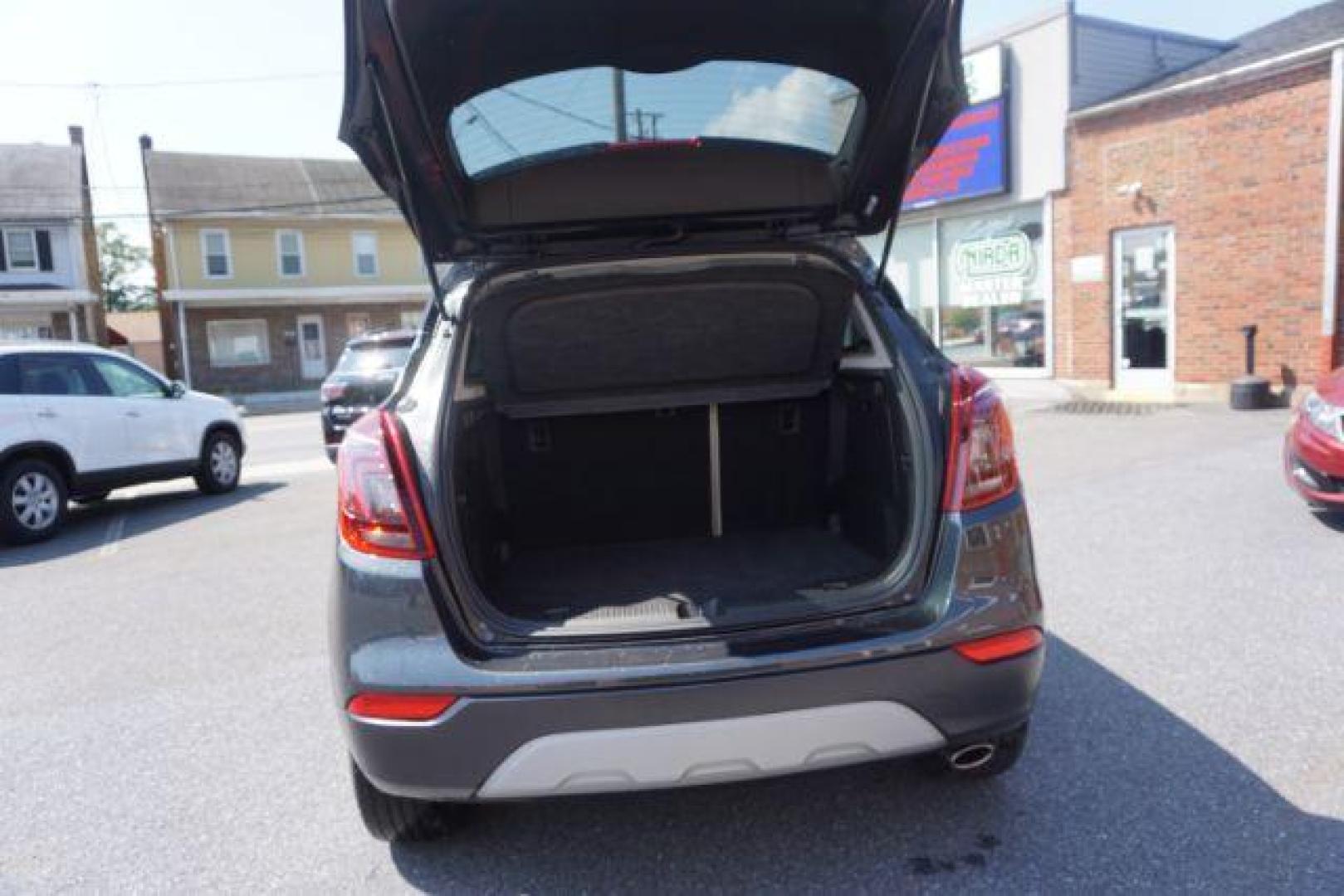 2018 Graphite Gray Metallic/Black Carbon Metallic /Shale Seats w/Ebony Accents, leather Buick Encore Essence AWD (KL4CJGSB1JB) with an 1.4L L4 DOHC 16V TURBO engine, 6-Speed Automatic transmission, located at 312 Centre Ave, Schuylkill Haven, PA, 17972, (570) 593-5278, 40.638130, -76.177383 - luggage rack - Photo#44