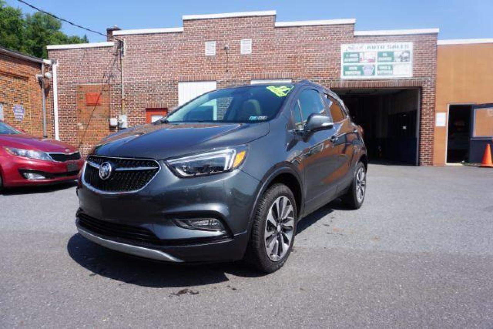 2018 Graphite Gray Metallic/Black Carbon Metallic /Shale Seats w/Ebony Accents, leather Buick Encore Essence AWD (KL4CJGSB1JB) with an 1.4L L4 DOHC 16V TURBO engine, 6-Speed Automatic transmission, located at 312 Centre Ave, Schuylkill Haven, PA, 17972, (570) 593-5278, 40.638130, -76.177383 - luggage rack - Photo#4