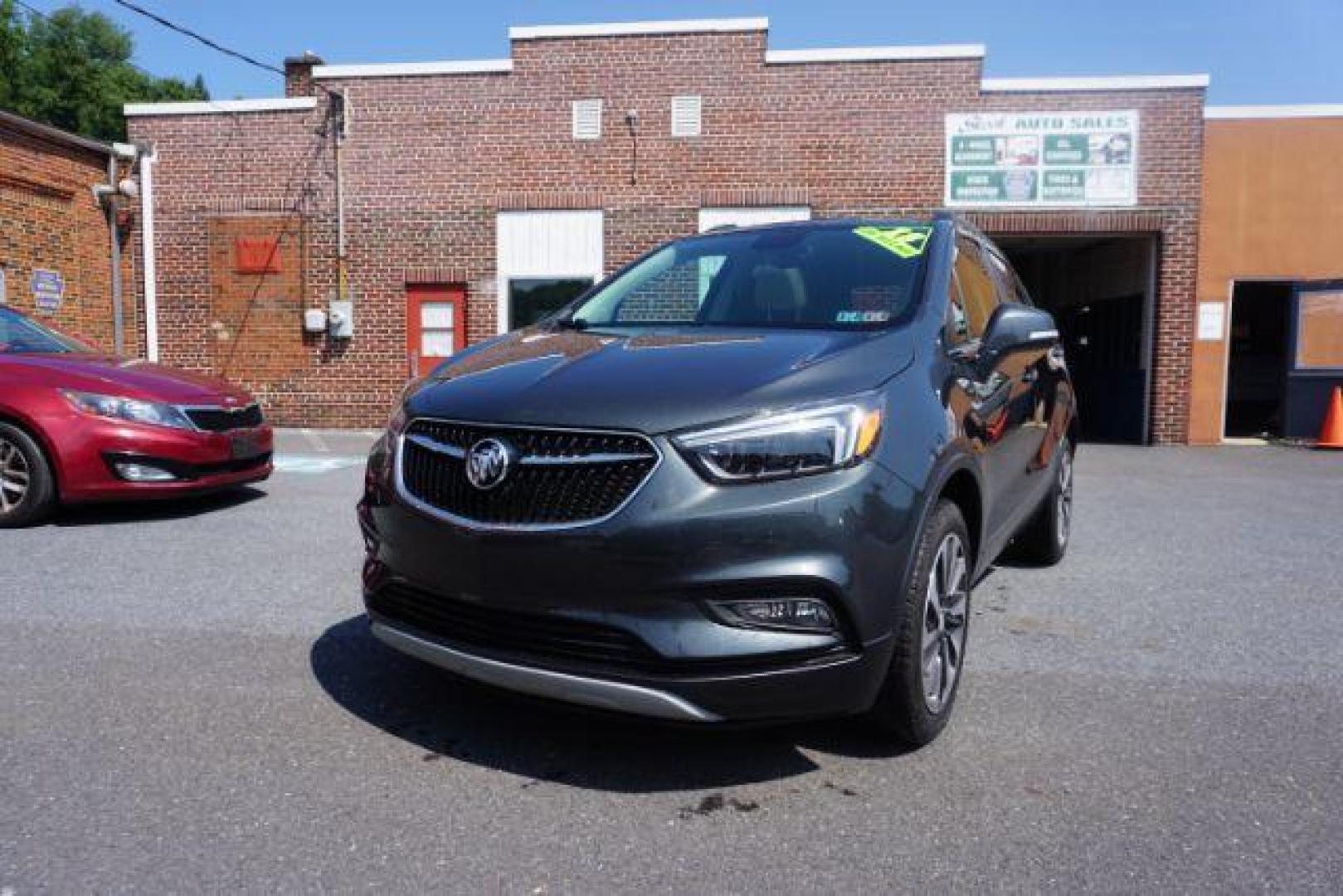 2018 Graphite Gray Metallic/Black Carbon Metallic /Shale Seats w/Ebony Accents, leather Buick Encore Essence AWD (KL4CJGSB1JB) with an 1.4L L4 DOHC 16V TURBO engine, 6-Speed Automatic transmission, located at 312 Centre Ave, Schuylkill Haven, PA, 17972, (570) 593-5278, 40.638130, -76.177383 - luggage rack - Photo#5