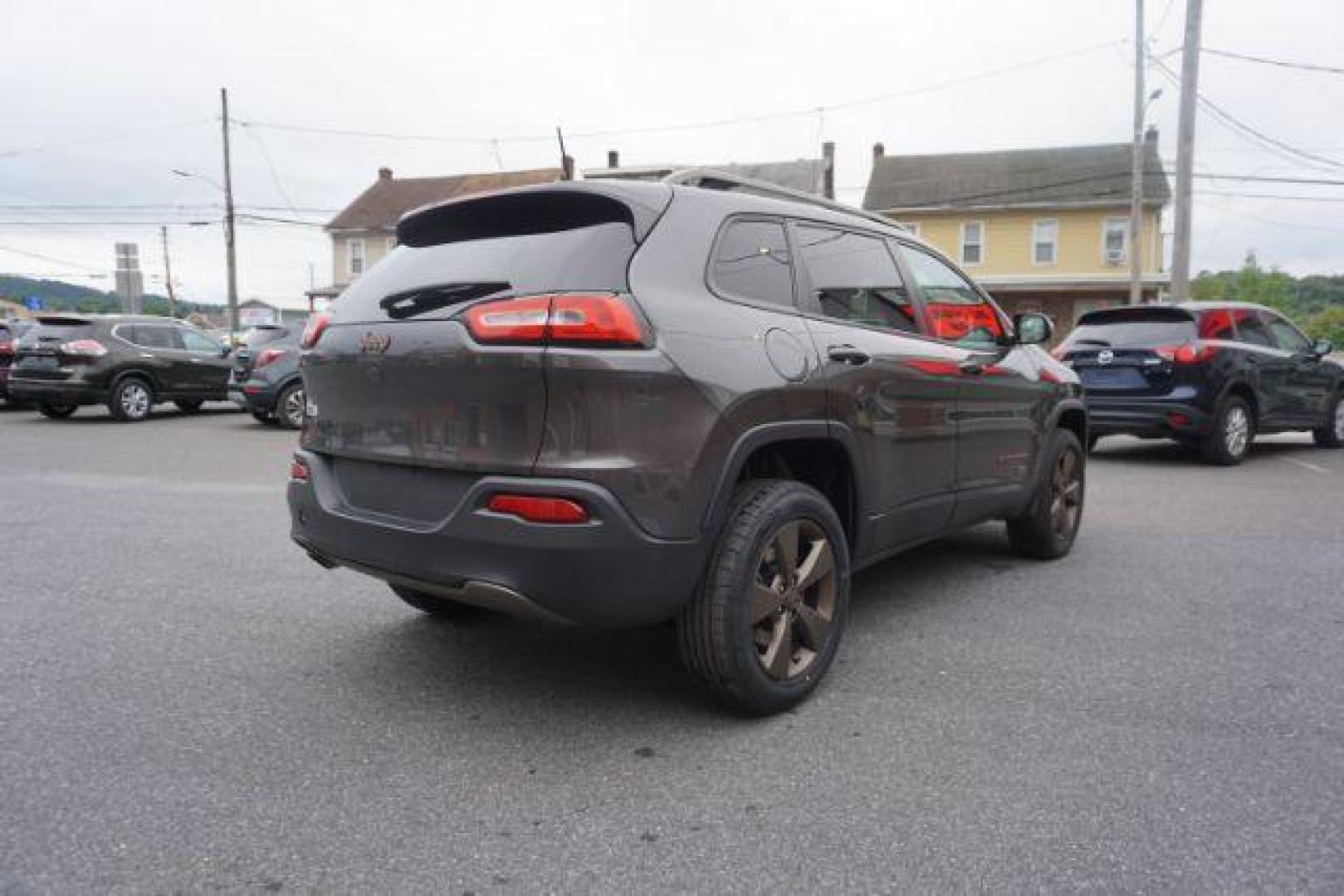 2016 Granite Crystal Metallic Clear Coat /Black, premium cloth Jeep Cherokee Latitude 4WD (1C4PJMCB8GW) with an 2.4L L4 DOHC 16V engine, 9-Speed Automatic transmission, located at 312 Centre Ave, Schuylkill Haven, PA, 17972, (570) 593-5278, 40.638130, -76.177383 - Automatic climate control, heated exterior mirrors, heated front seats, luggage rack, power drivers seat, power liftgate, power sunroof, rear parking sensors. - Photo#12