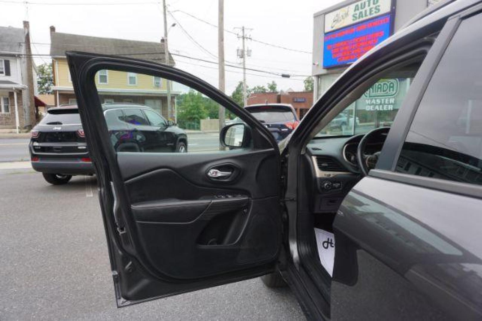 2016 Granite Crystal Metallic Clear Coat /Black, premium cloth Jeep Cherokee Latitude 4WD (1C4PJMCB8GW) with an 2.4L L4 DOHC 16V engine, 9-Speed Automatic transmission, located at 312 Centre Ave, Schuylkill Haven, PA, 17972, (570) 593-5278, 40.638130, -76.177383 - Automatic climate control, heated exterior mirrors, heated front seats, luggage rack, power drivers seat, power liftgate, power sunroof, rear parking sensors. - Photo#17