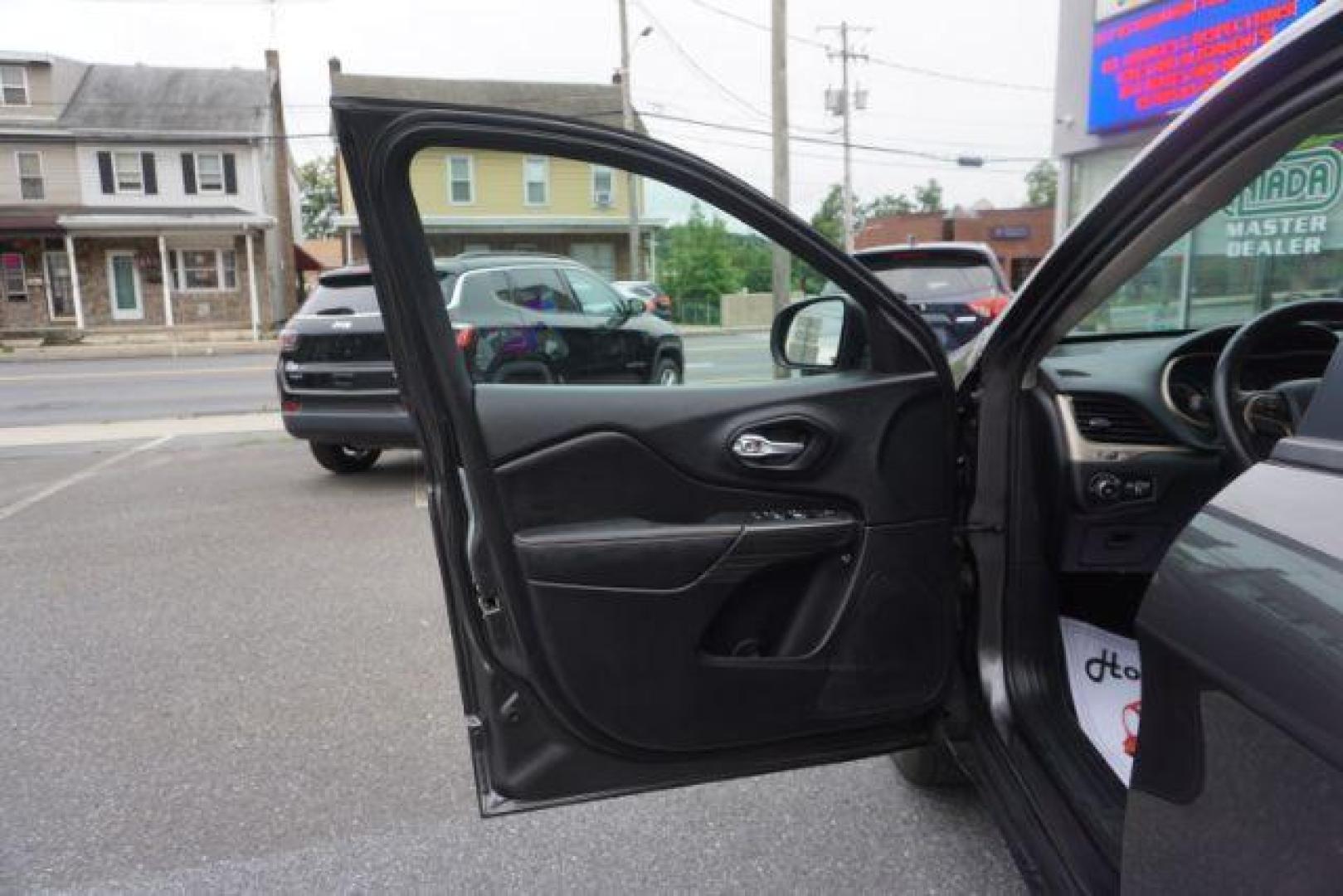 2016 Granite Crystal Metallic Clear Coat /Black, premium cloth Jeep Cherokee Latitude 4WD (1C4PJMCB8GW) with an 2.4L L4 DOHC 16V engine, 9-Speed Automatic transmission, located at 312 Centre Ave, Schuylkill Haven, PA, 17972, (570) 593-5278, 40.638130, -76.177383 - Automatic climate control, heated exterior mirrors, heated front seats, luggage rack, power drivers seat, power liftgate, power sunroof, rear parking sensors. - Photo#18