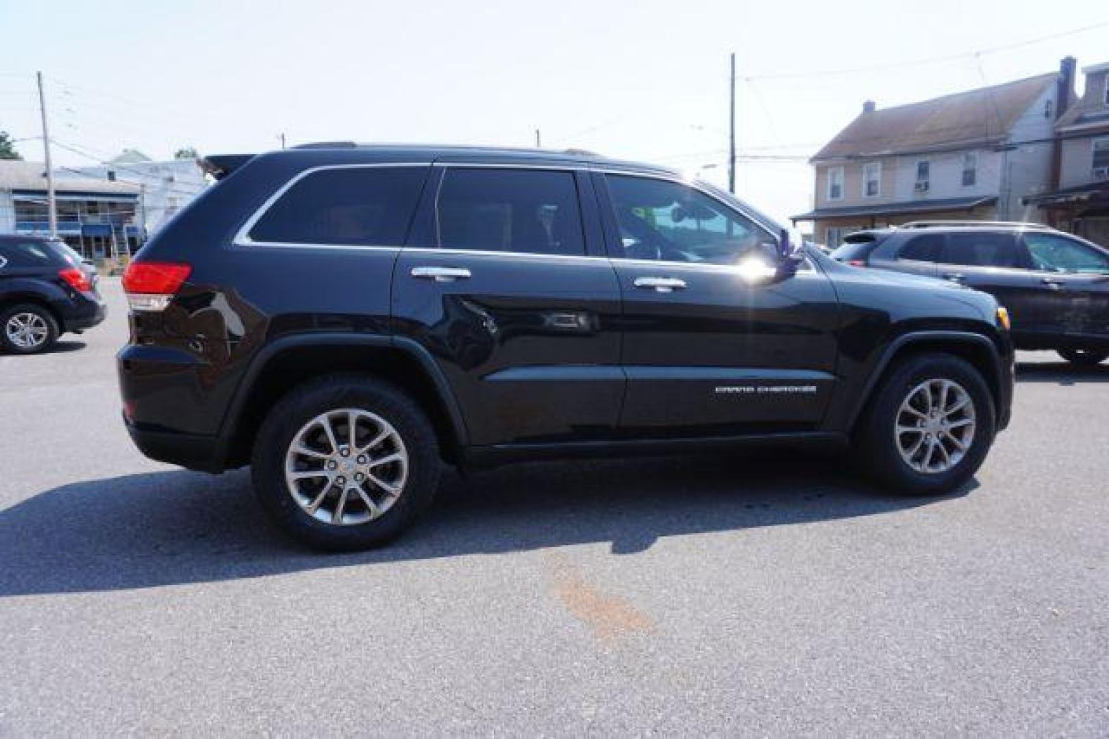 2015 Brilliant Black Crystal P /Black Jeep Grand Cherokee Limited 4WD (1C4RJFBG6FC) with an 3.6L V6 DOHC 24V engine, 8-Speed Automatic transmission, located at 312 Centre Ave, Schuylkill Haven, PA, 17972, (570) 593-5278, 40.638130, -76.177383 - adaptive cruise control, advanced technology pkg, back up camera, blind spot monitor, collision avoidance system, cooled front seats, HID headlamps, heated front seats, leather seats, navigation system, power liftgate, power sunroof, rear parking sensors, towing pkg, universal garage door opener - Photo#10