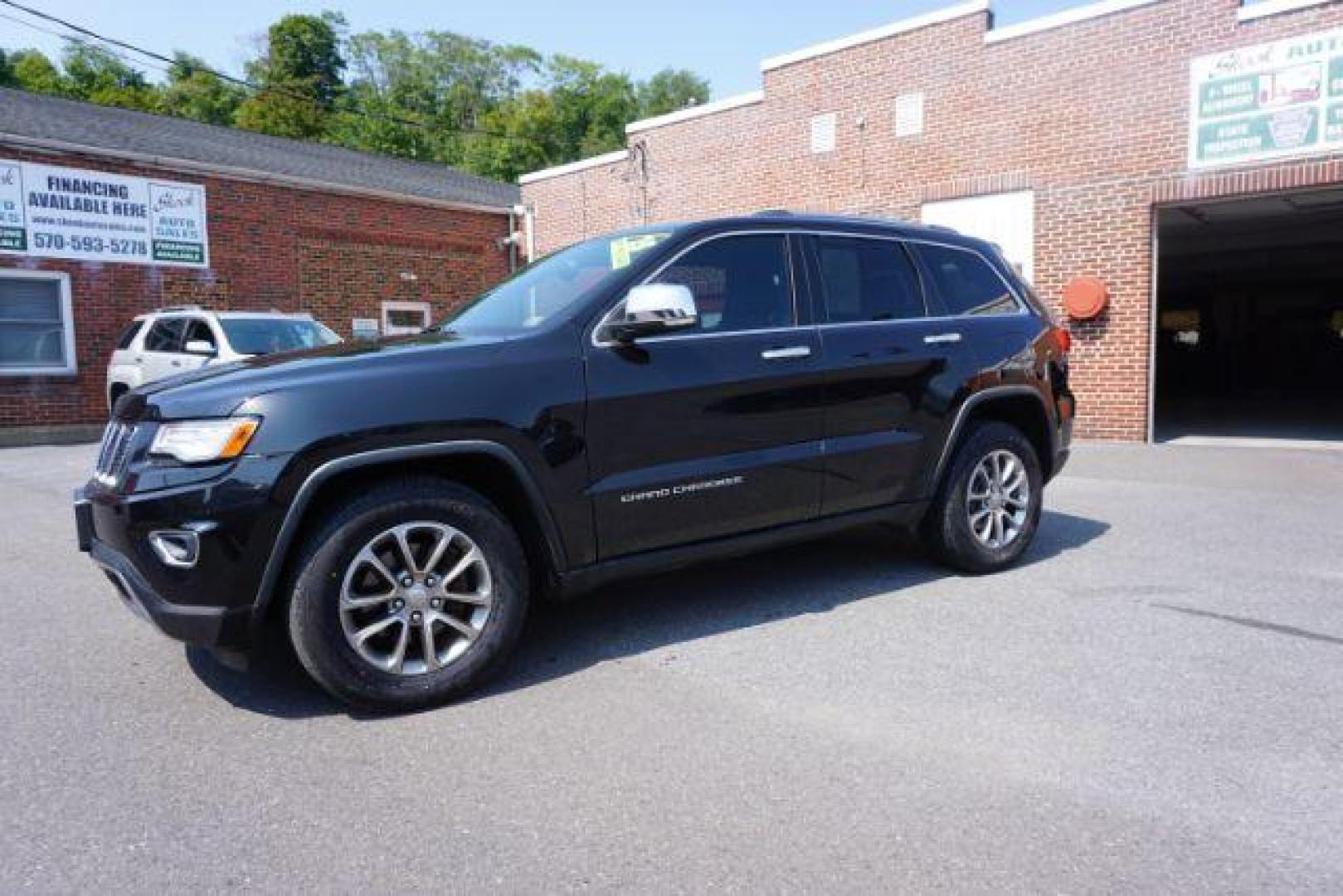 2015 Brilliant Black Crystal P /Black Jeep Grand Cherokee Limited 4WD (1C4RJFBG6FC) with an 3.6L V6 DOHC 24V engine, 8-Speed Automatic transmission, located at 312 Centre Ave, Schuylkill Haven, PA, 17972, (570) 593-5278, 40.638130, -76.177383 - adaptive cruise control, advanced technology pkg, back up camera, blind spot monitor, collision avoidance system, cooled front seats, HID headlamps, heated front seats, leather seats, navigation system, power liftgate, power sunroof, rear parking sensors, towing pkg, universal garage door opener - Photo#1