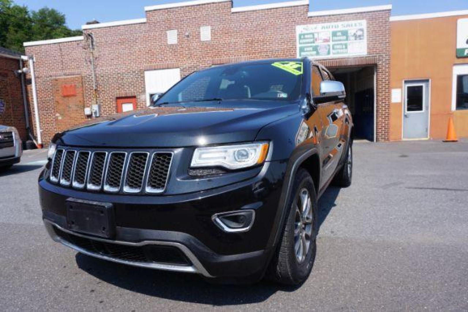 2015 Brilliant Black Crystal P /Black Jeep Grand Cherokee Limited 4WD (1C4RJFBG6FC) with an 3.6L V6 DOHC 24V engine, 8-Speed Automatic transmission, located at 312 Centre Ave, Schuylkill Haven, PA, 17972, (570) 593-5278, 40.638130, -76.177383 - adaptive cruise control, advanced technology pkg, back up camera, blind spot monitor, collision avoidance system, cooled front seats, HID headlamps, heated front seats, leather seats, navigation system, power liftgate, power sunroof, rear parking sensors, towing pkg, universal garage door opener - Photo#5