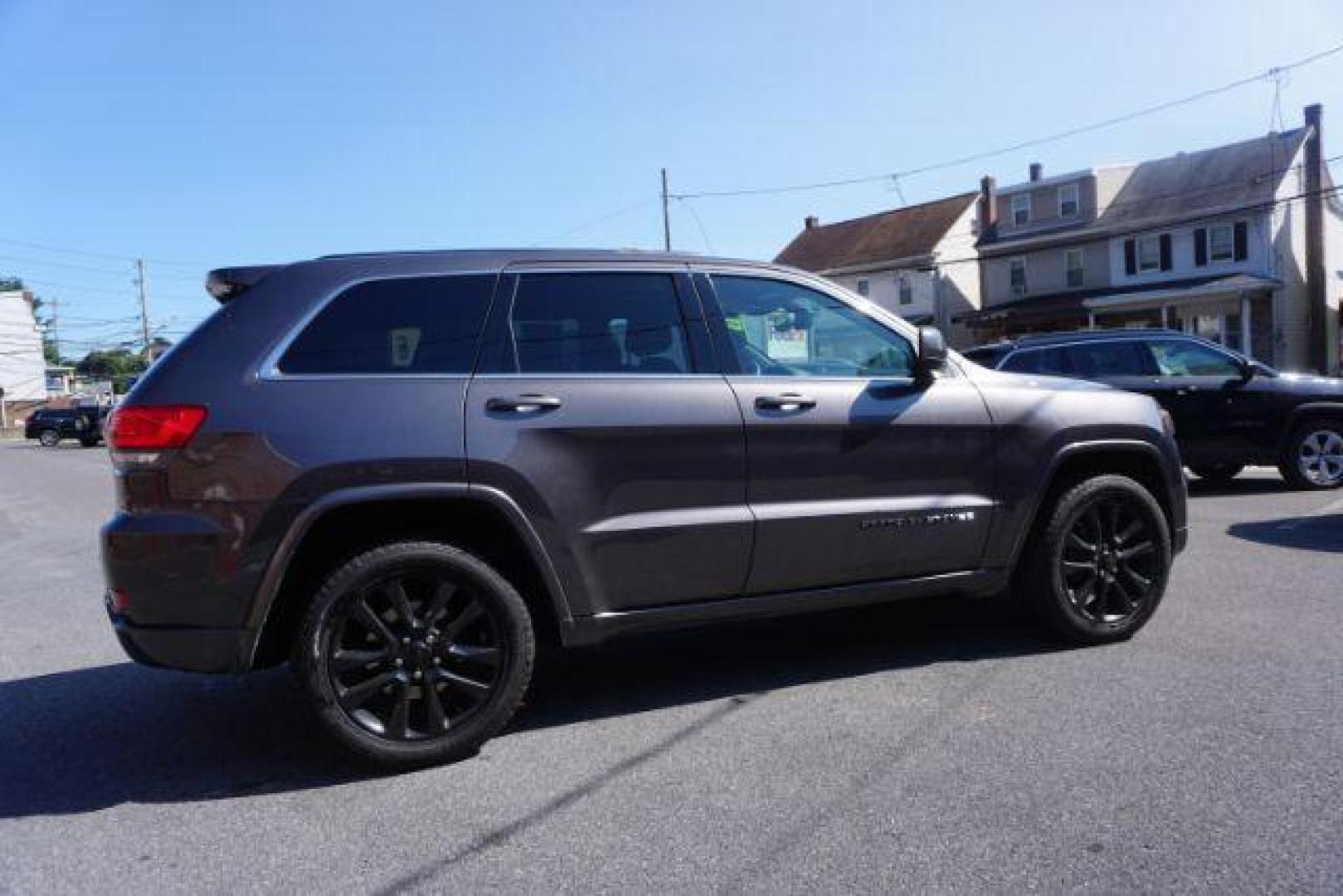 2015 Granite Crystal Met CC /Black Jeep Grand Cherokee Laredo 4WD (1C4RJFAG1FC) with an 3.6L V6 DOHC 24V engine, 8-Speed Automatic transmission, located at 312 Centre Ave, Schuylkill Haven, PA, 17972, (570) 593-5278, 40.638130, -76.177383 - leather seats, back up camera, heated front seats, power liftgate, rear parking sensors - Photo#12