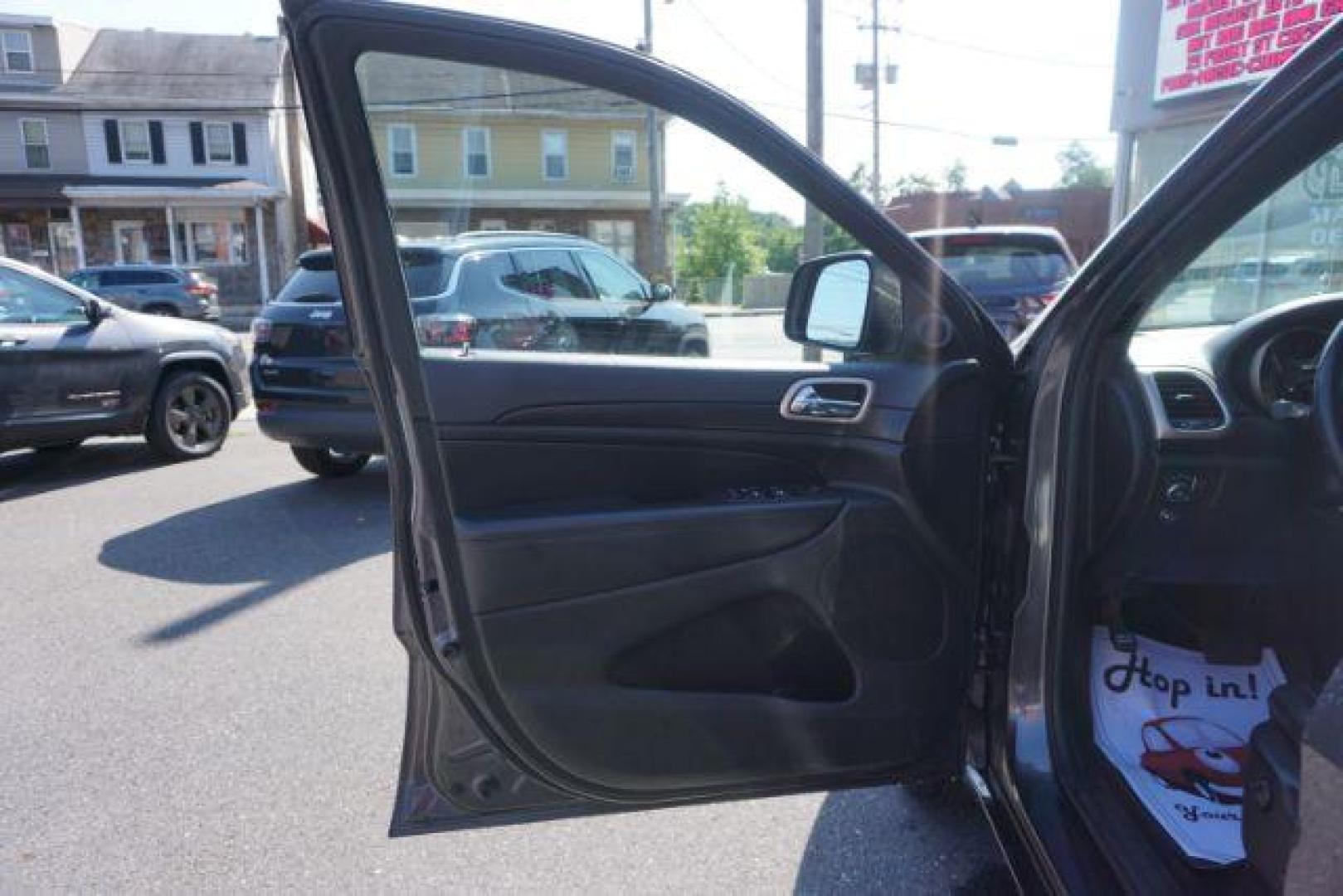 2015 Granite Crystal Met CC /Black Jeep Grand Cherokee Laredo 4WD (1C4RJFAG1FC) with an 3.6L V6 DOHC 24V engine, 8-Speed Automatic transmission, located at 312 Centre Ave, Schuylkill Haven, PA, 17972, (570) 593-5278, 40.638130, -76.177383 - leather seats, back up camera, heated front seats, power liftgate, rear parking sensors - Photo#18