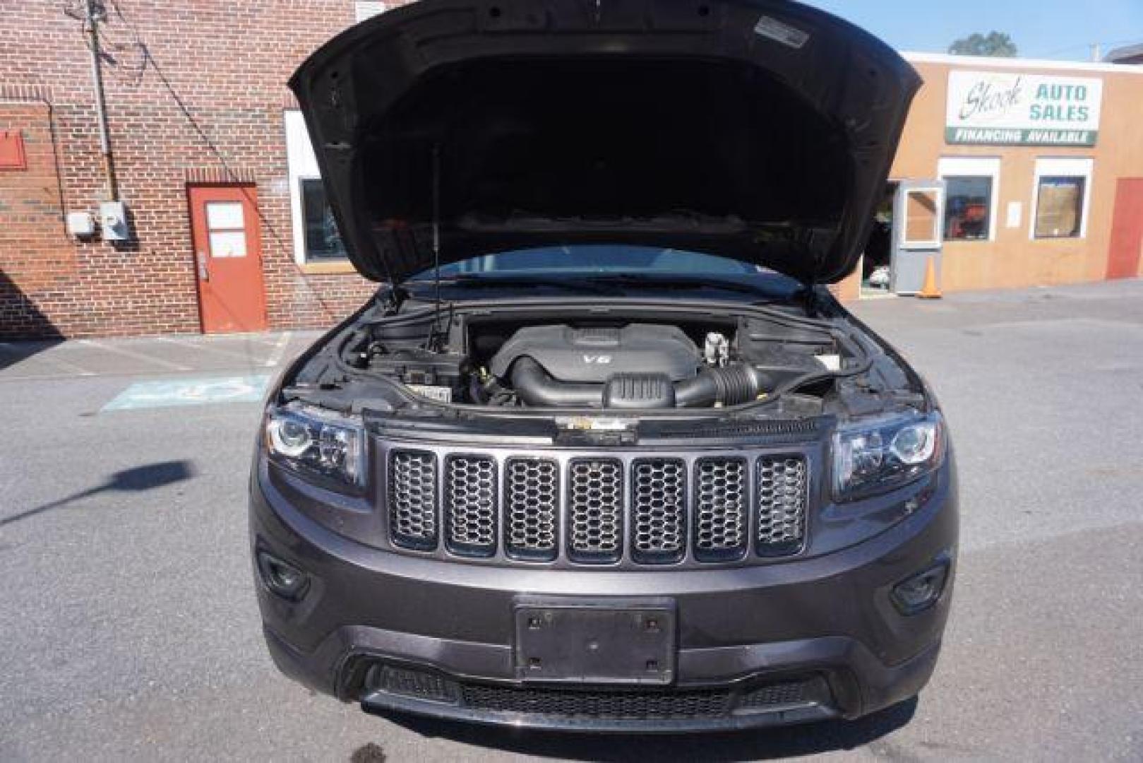 2015 Granite Crystal Met CC /Black Jeep Grand Cherokee Laredo 4WD (1C4RJFAG1FC) with an 3.6L V6 DOHC 24V engine, 8-Speed Automatic transmission, located at 312 Centre Ave, Schuylkill Haven, PA, 17972, (570) 593-5278, 40.638130, -76.177383 - leather seats, back up camera, heated front seats, power liftgate, rear parking sensors - Photo#60