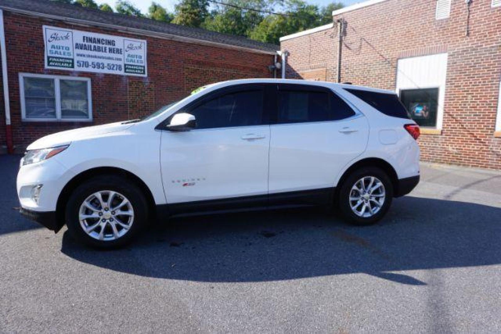 2020 Summit White /Jet Black, premium cloth Chevrolet Equinox LT AWD (2GNAXUEV2L6) with an 1.5L L4 DOHC 16V TURBO engine, 6-Speed Automatic transmission, located at 312 Centre Ave, Schuylkill Haven, PA, 17972, (570) 593-5278, 40.638130, -76.177383 - Navigation system - Photo#1