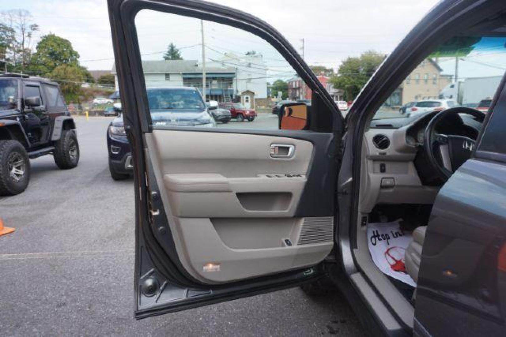 2011 Mocha Metallic /Gray Leather Interior Honda Pilot EX-L 4WD 5-Spd AT (5FNYF4H59BB) with an 3.5L V6 SOHC 24V engine, 5-Speed Automatic transmission, located at 312 Centre Ave, Schuylkill Haven, PA, 17972, (570) 593-5278, 40.638130, -76.177383 - Photo#17