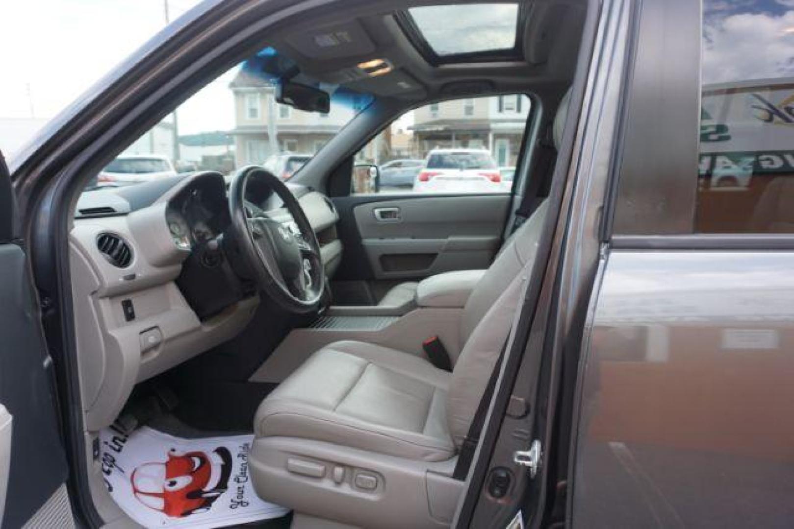 2011 Mocha Metallic /Gray Leather Interior Honda Pilot EX-L 4WD 5-Spd AT (5FNYF4H59BB) with an 3.5L V6 SOHC 24V engine, 5-Speed Automatic transmission, located at 312 Centre Ave, Schuylkill Haven, PA, 17972, (570) 593-5278, 40.638130, -76.177383 - Photo#19