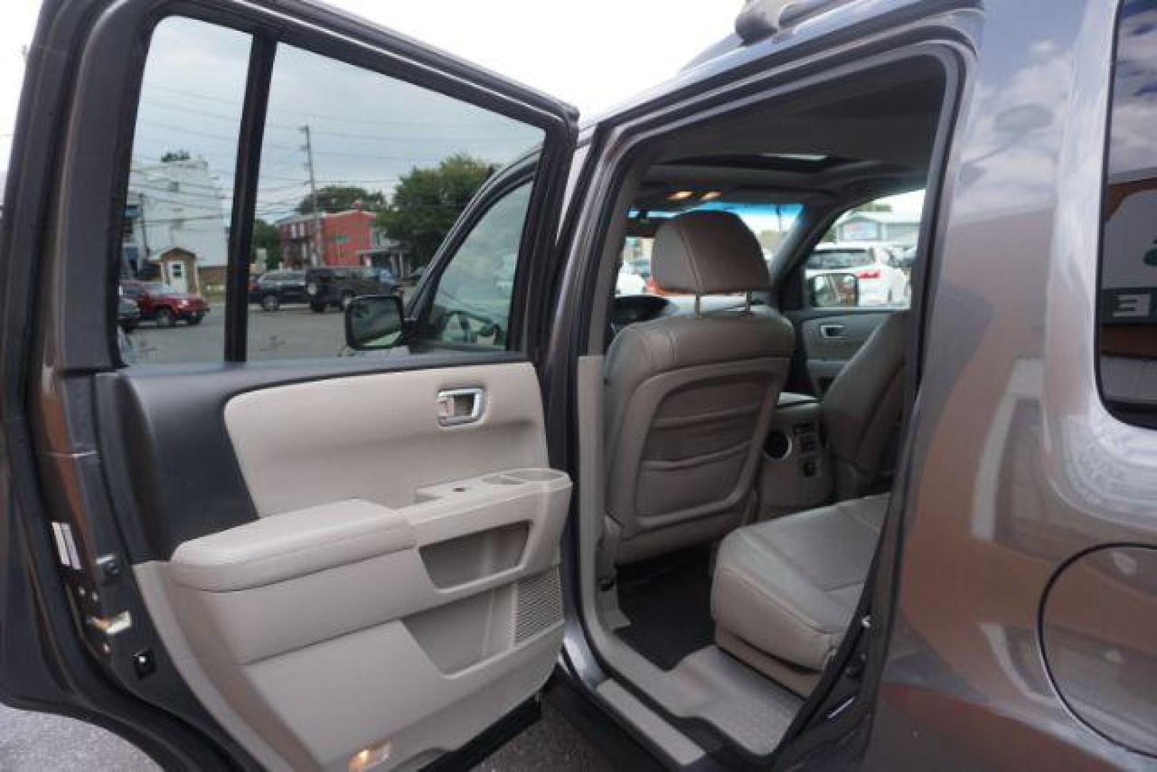 2011 Mocha Metallic /Gray Leather Interior Honda Pilot EX-L 4WD 5-Spd AT (5FNYF4H59BB) with an 3.5L V6 SOHC 24V engine, 5-Speed Automatic transmission, located at 312 Centre Ave, Schuylkill Haven, PA, 17972, (570) 593-5278, 40.638130, -76.177383 - Photo#30