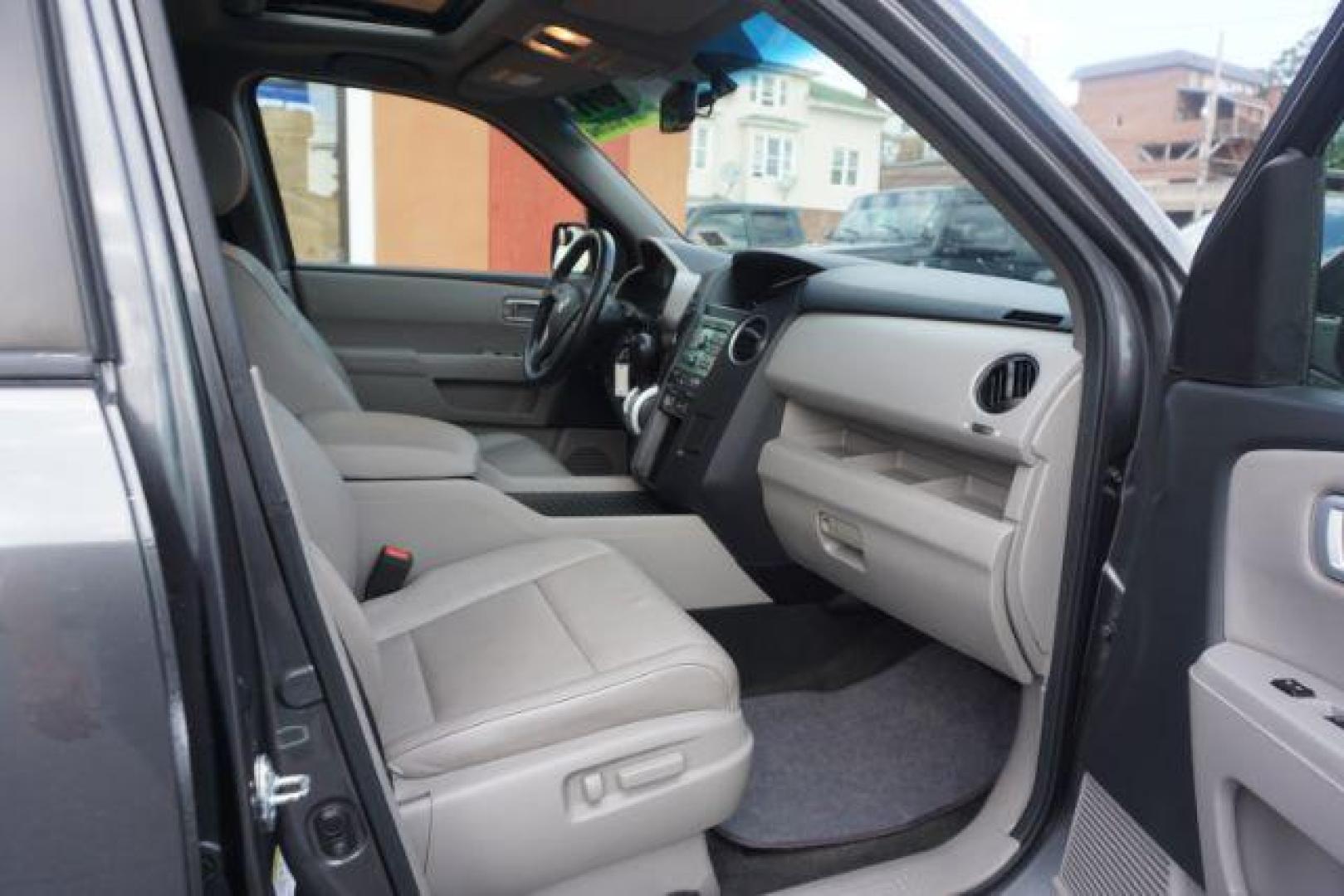 2011 Mocha Metallic /Gray Leather Interior Honda Pilot EX-L 4WD 5-Spd AT (5FNYF4H59BB) with an 3.5L V6 SOHC 24V engine, 5-Speed Automatic transmission, located at 312 Centre Ave, Schuylkill Haven, PA, 17972, (570) 593-5278, 40.638130, -76.177383 - Photo#52