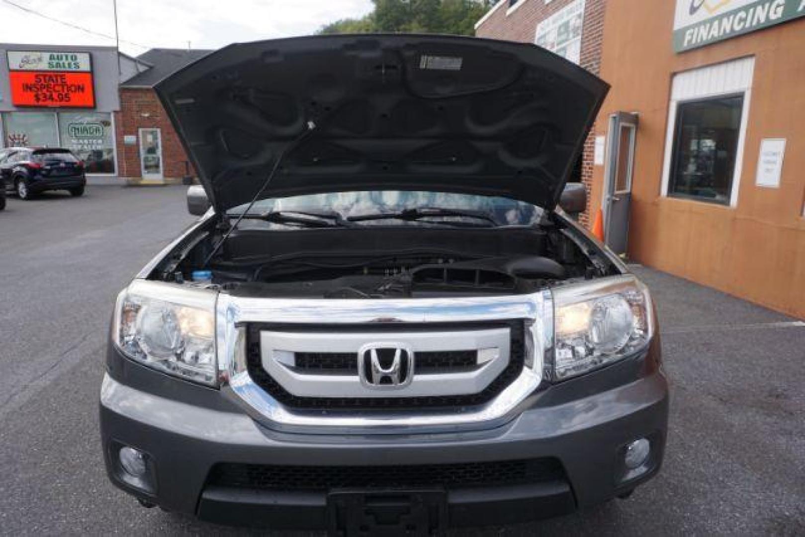 2011 Mocha Metallic /Gray Leather Interior Honda Pilot EX-L 4WD 5-Spd AT (5FNYF4H59BB) with an 3.5L V6 SOHC 24V engine, 5-Speed Automatic transmission, located at 312 Centre Ave, Schuylkill Haven, PA, 17972, (570) 593-5278, 40.638130, -76.177383 - Photo#57