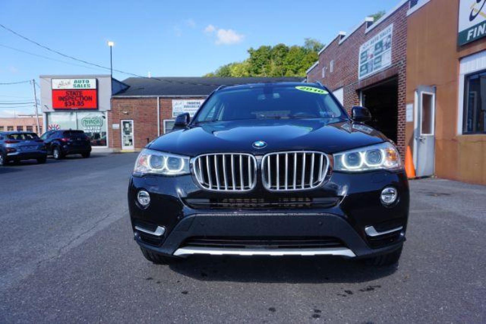 2016 Black Sapphire Metallic /Beige SensaTec, leatherette BMW X3 xDrive28i (5UXWX9C53G0) with an 2.0L L4 DOHC 16V engine, 8-Speed Automatic transmission, located at 312 Centre Ave, Schuylkill Haven, PA, 17972, (570) 593-5278, 40.638130, -76.177383 - adaptive cruise control, blind spot monitor, collision avoidance system, driver assist plus pkg, HID headlamps, lane departure warning, M Sport Pkg - Photo#2