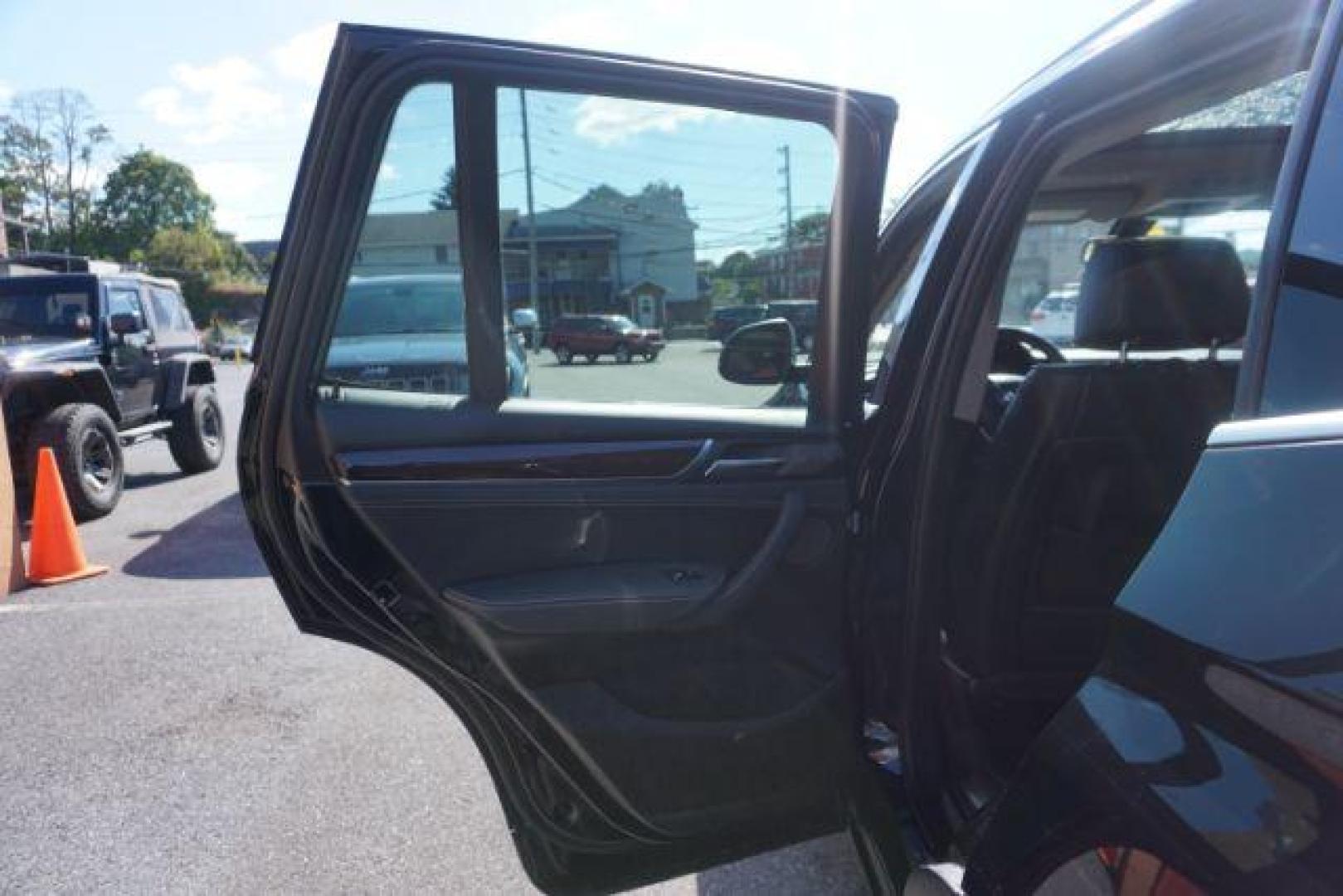 2016 Black Sapphire Metallic /Beige SensaTec, leatherette BMW X3 xDrive28i (5UXWX9C53G0) with an 2.0L L4 DOHC 16V engine, 8-Speed Automatic transmission, located at 312 Centre Ave, Schuylkill Haven, PA, 17972, (570) 593-5278, 40.638130, -76.177383 - adaptive cruise control, blind spot monitor, collision avoidance system, driver assist plus pkg, HID headlamps, lane departure warning, M Sport Pkg - Photo#35