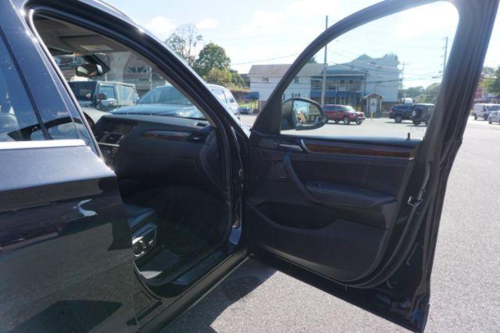 2016 Black Sapphire Metallic /Beige SensaTec, leatherette BMW X3 xDrive28i (5UXWX9C53G0) with an 2.0L L4 DOHC 16V engine, 8-Speed Automatic transmission, located at 312 Centre Ave, Schuylkill Haven, PA, 17972, (570) 593-5278, 40.638130, -76.177383 - adaptive cruise control, blind spot monitor, collision avoidance system, driver assist plus pkg, HID headlamps, lane departure warning, M Sport Pkg - Photo#52