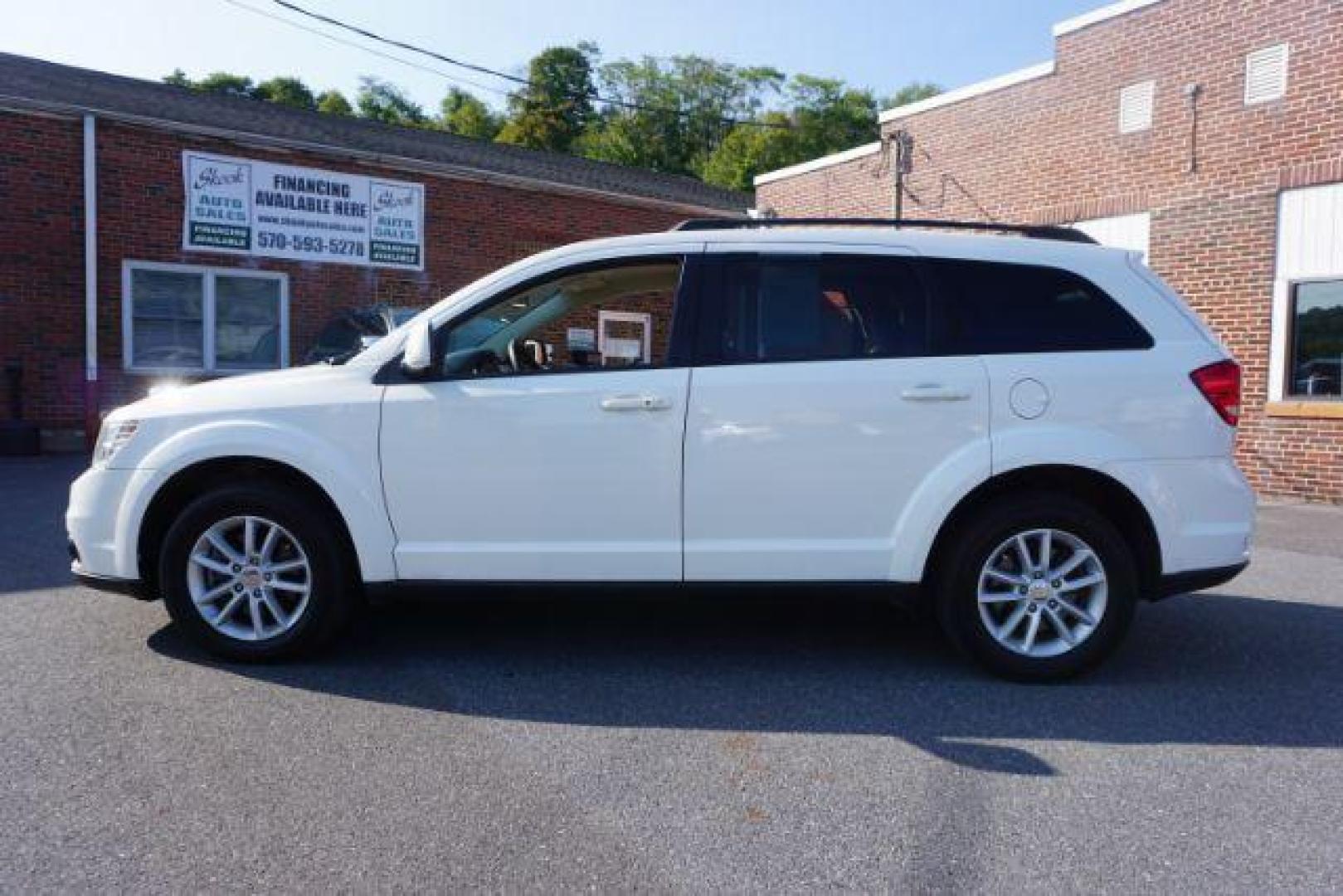 2016 Pearl White Tri-Coat /Black/Light Frost Beige, premium cloth Dodge Journey SXT AWD (3C4PDDBG5GT) with an 3.6L V6 DOHC 24V engine, 6-Speed Automatic transmission, located at 312 Centre Ave, Schuylkill Haven, PA, 17972, (570) 593-5278, 40.638130, -76.177383 - back up camera, power driver's seat, rear parking sensors - Photo#0