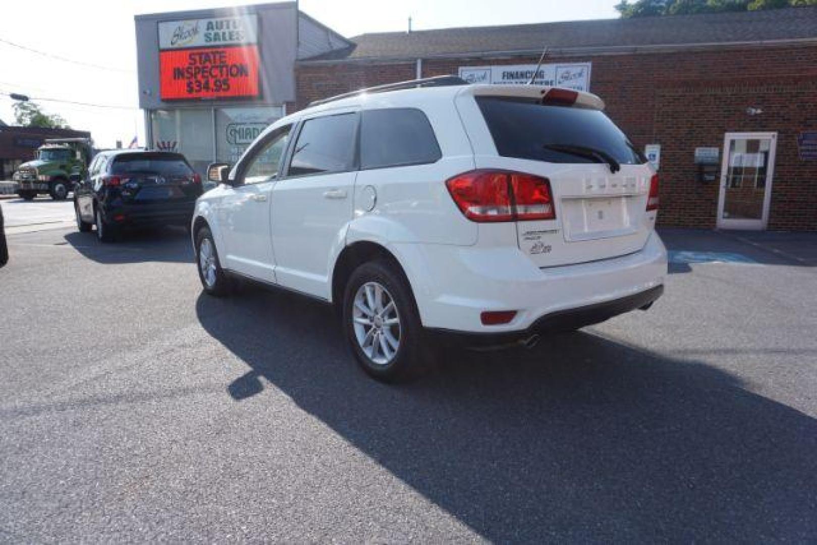 2016 Pearl White Tri-Coat /Black/Light Frost Beige, premium cloth Dodge Journey SXT AWD (3C4PDDBG5GT) with an 3.6L V6 DOHC 24V engine, 6-Speed Automatic transmission, located at 312 Centre Ave, Schuylkill Haven, PA, 17972, (570) 593-5278, 40.638130, -76.177383 - back up camera, power driver's seat, rear parking sensors - Photo#17