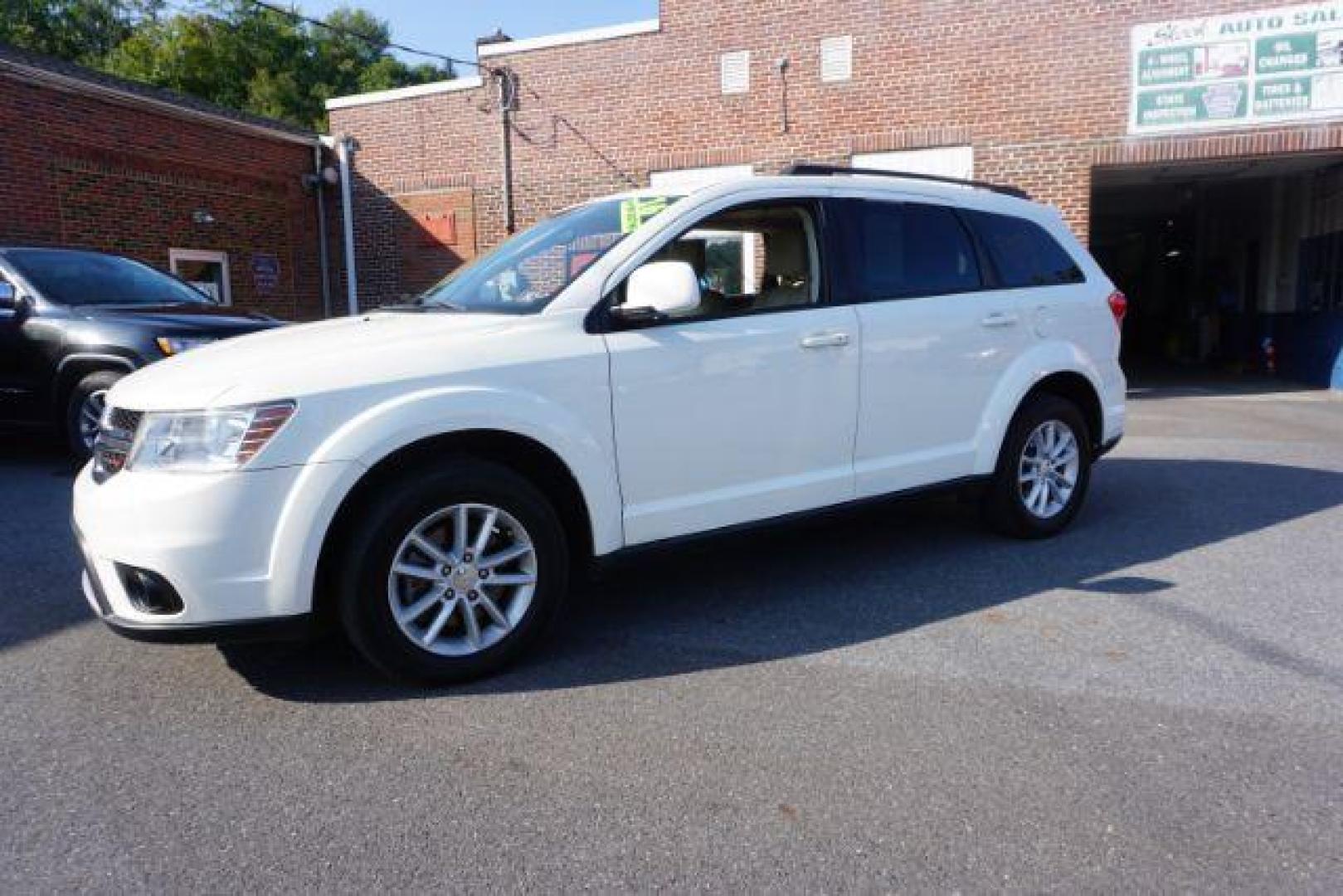 2016 Pearl White Tri-Coat /Black/Light Frost Beige, premium cloth Dodge Journey SXT AWD (3C4PDDBG5GT) with an 3.6L V6 DOHC 24V engine, 6-Speed Automatic transmission, located at 312 Centre Ave, Schuylkill Haven, PA, 17972, (570) 593-5278, 40.638130, -76.177383 - back up camera, power driver's seat, rear parking sensors - Photo#1