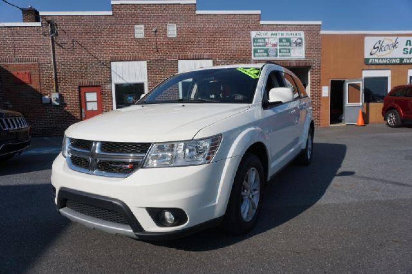 2016 Pearl White Tri-Coat /Black/Light Frost Beige, premium cloth Dodge Journey SXT AWD (3C4PDDBG5GT) with an 3.6L V6 DOHC 24V engine, 6-Speed Automatic transmission, located at 312 Centre Ave, Schuylkill Haven, PA, 17972, (570) 593-5278, 40.638130, -76.177383 - back up camera, power driver's seat, rear parking sensors - Photo#4