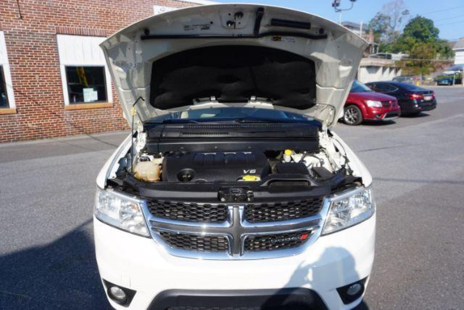 2016 Pearl White Tri-Coat /Black/Light Frost Beige, premium cloth Dodge Journey SXT AWD (3C4PDDBG5GT) with an 3.6L V6 DOHC 24V engine, 6-Speed Automatic transmission, located at 312 Centre Ave, Schuylkill Haven, PA, 17972, (570) 593-5278, 40.638130, -76.177383 - back up camera, power driver's seat, rear parking sensors - Photo#62