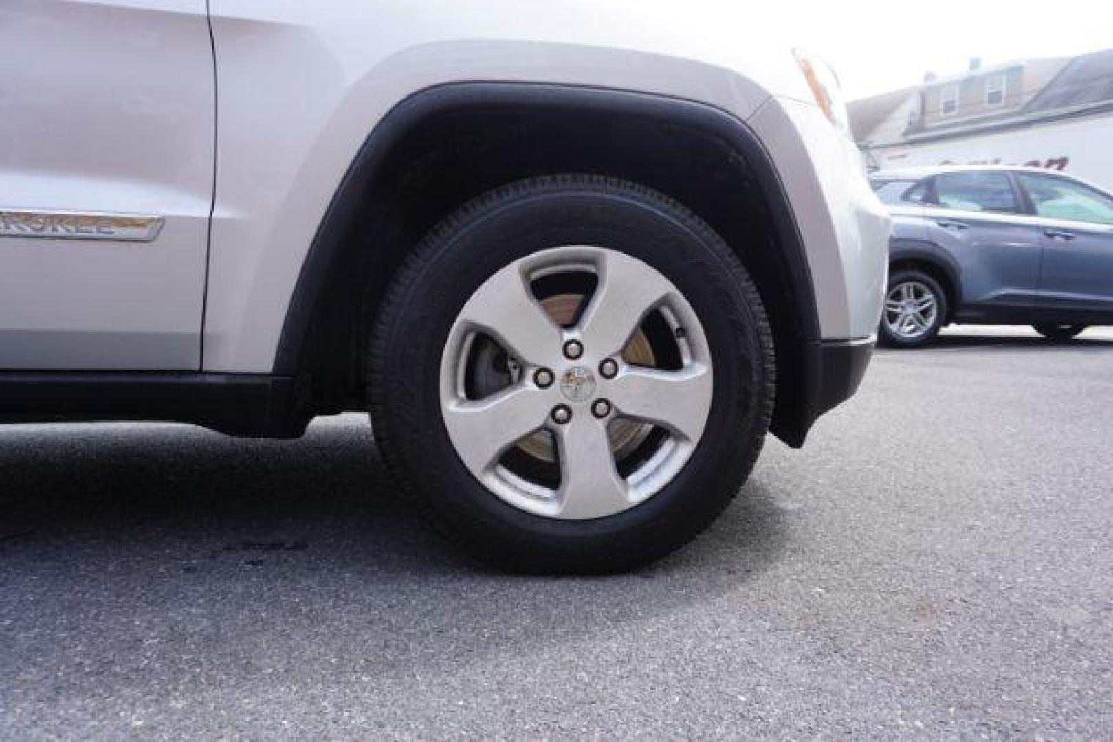 2012 Bright Silver Metallic /Black Leather Interior Jeep Grand Cherokee Laredo 4WD (1C4RJFAG2CC) with an 3.6L V6 DOHC 24V engine, 5-Speed Automatic transmission, located at 312 Centre Ave, Schuylkill Haven, PA, 17972, (570) 593-5278, 40.638130, -76.177383 - automatic climate control, back up camera, heated front seats, leather seats, navigation, power liftgate, rear parking sensors - Photo#9