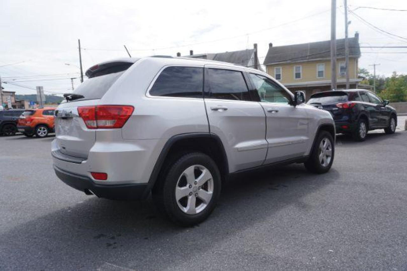 2012 Bright Silver Metallic /Black Leather Interior Jeep Grand Cherokee Laredo 4WD (1C4RJFAG2CC) with an 3.6L V6 DOHC 24V engine, 5-Speed Automatic transmission, located at 312 Centre Ave, Schuylkill Haven, PA, 17972, (570) 593-5278, 40.638130, -76.177383 - automatic climate control, back up camera, heated front seats, leather seats, navigation, power liftgate, rear parking sensors - Photo#11