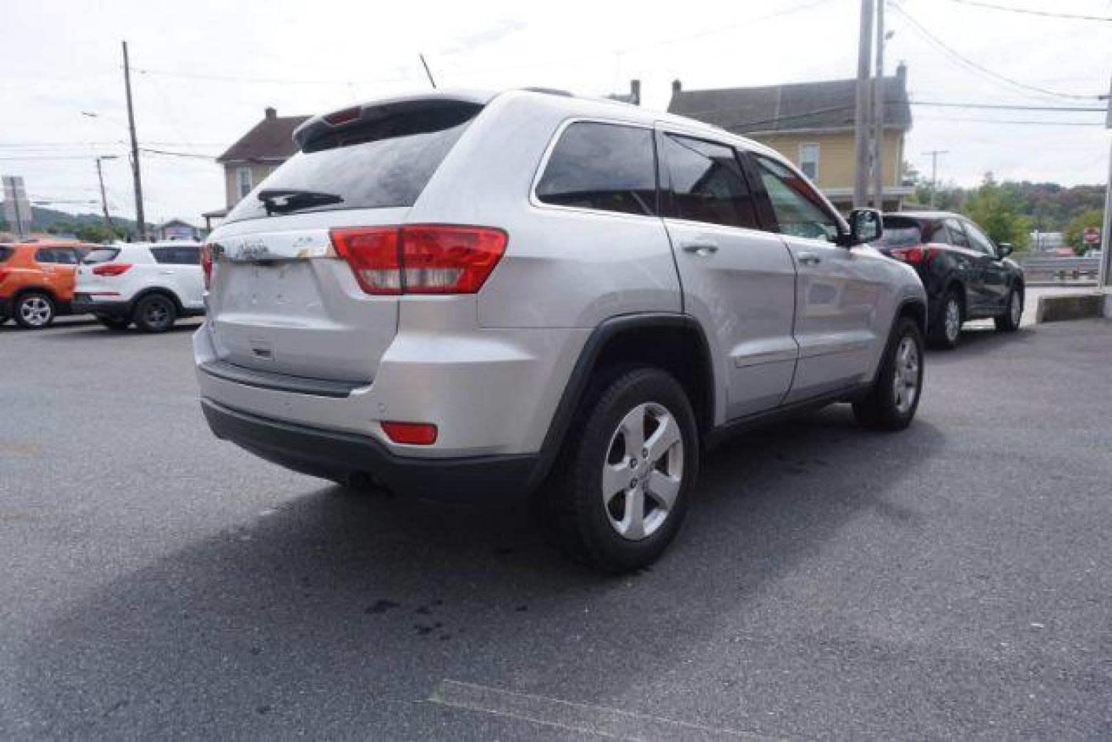 2012 Bright Silver Metallic /Black Leather Interior Jeep Grand Cherokee Laredo 4WD (1C4RJFAG2CC) with an 3.6L V6 DOHC 24V engine, 5-Speed Automatic transmission, located at 312 Centre Ave, Schuylkill Haven, PA, 17972, (570) 593-5278, 40.638130, -76.177383 - automatic climate control, back up camera, heated front seats, leather seats, navigation, power liftgate, rear parking sensors - Photo#12