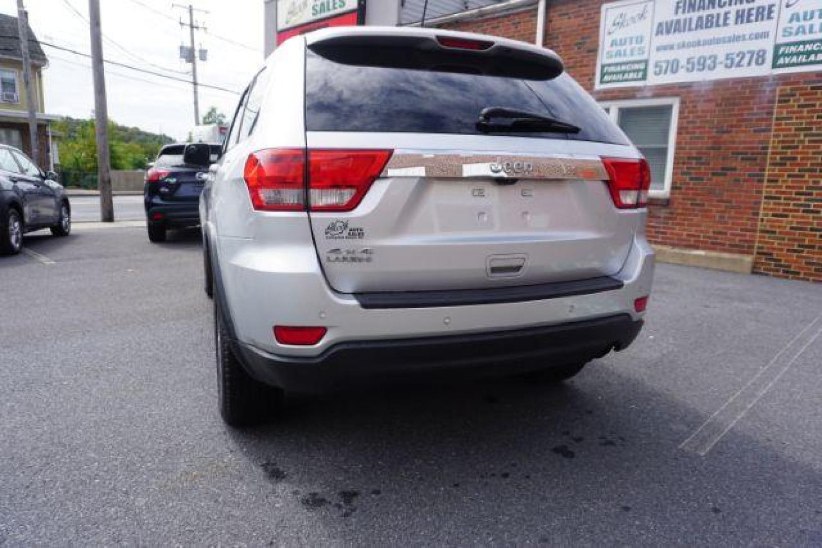 2012 Bright Silver Metallic /Black Leather Interior Jeep Grand Cherokee Laredo 4WD (1C4RJFAG2CC) with an 3.6L V6 DOHC 24V engine, 5-Speed Automatic transmission, located at 312 Centre Ave, Schuylkill Haven, PA, 17972, (570) 593-5278, 40.638130, -76.177383 - automatic climate control, back up camera, heated front seats, leather seats, navigation, power liftgate, rear parking sensors - Photo#15