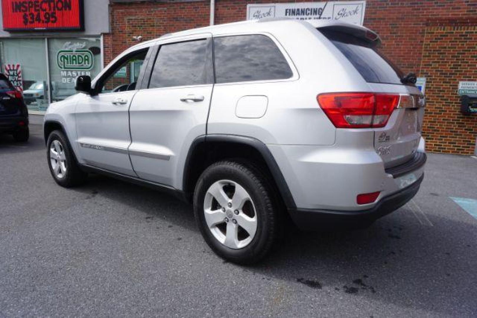 2012 Bright Silver Metallic /Black Leather Interior Jeep Grand Cherokee Laredo 4WD (1C4RJFAG2CC) with an 3.6L V6 DOHC 24V engine, 5-Speed Automatic transmission, located at 312 Centre Ave, Schuylkill Haven, PA, 17972, (570) 593-5278, 40.638130, -76.177383 - automatic climate control, back up camera, heated front seats, leather seats, navigation, power liftgate, rear parking sensors - Photo#17