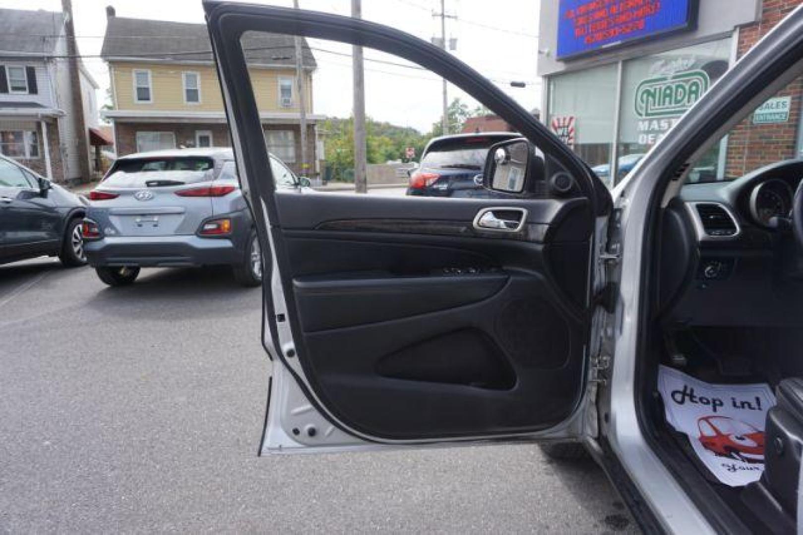 2012 Bright Silver Metallic /Black Leather Interior Jeep Grand Cherokee Laredo 4WD (1C4RJFAG2CC) with an 3.6L V6 DOHC 24V engine, 5-Speed Automatic transmission, located at 312 Centre Ave, Schuylkill Haven, PA, 17972, (570) 593-5278, 40.638130, -76.177383 - automatic climate control, back up camera, heated front seats, leather seats, navigation, power liftgate, rear parking sensors - Photo#19