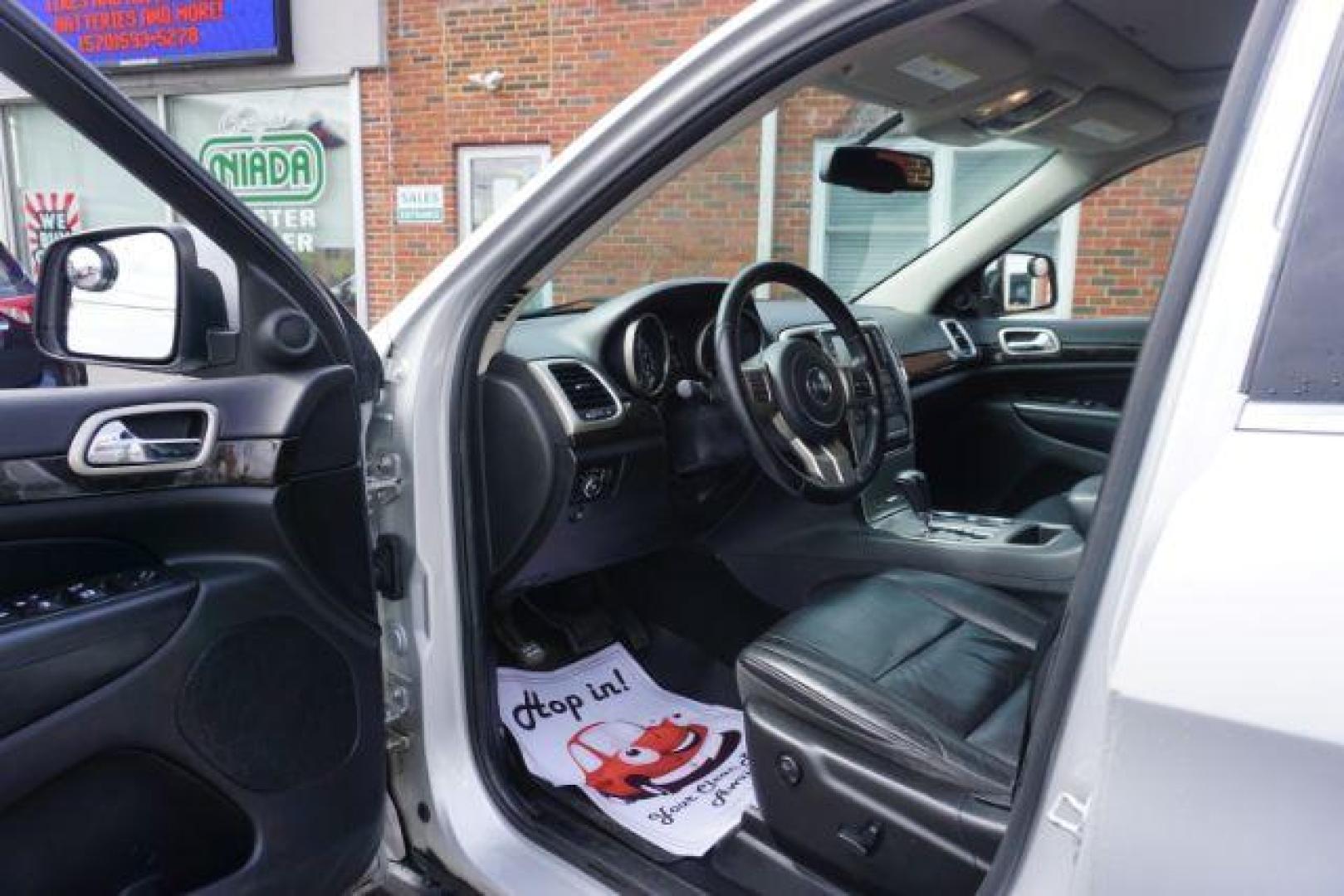 2012 Bright Silver Metallic /Black Leather Interior Jeep Grand Cherokee Laredo 4WD (1C4RJFAG2CC) with an 3.6L V6 DOHC 24V engine, 5-Speed Automatic transmission, located at 312 Centre Ave, Schuylkill Haven, PA, 17972, (570) 593-5278, 40.638130, -76.177383 - automatic climate control, back up camera, heated front seats, leather seats, navigation, power liftgate, rear parking sensors - Photo#20