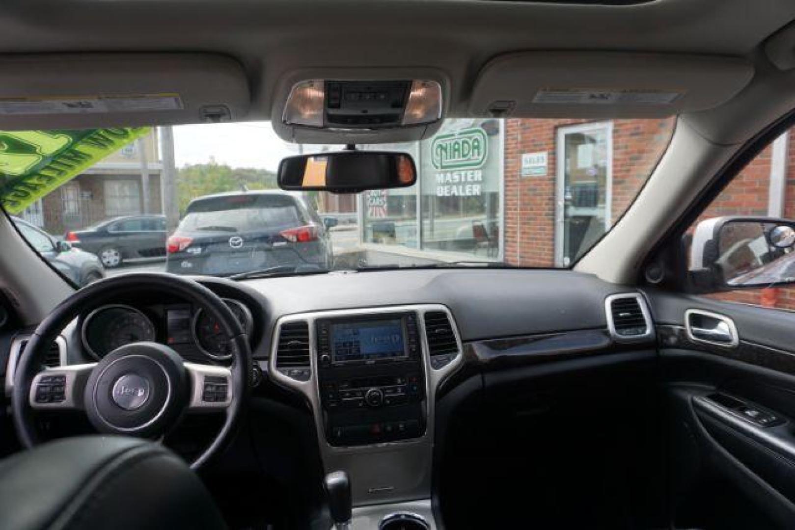 2012 Bright Silver Metallic /Black Leather Interior Jeep Grand Cherokee Laredo 4WD (1C4RJFAG2CC) with an 3.6L V6 DOHC 24V engine, 5-Speed Automatic transmission, located at 312 Centre Ave, Schuylkill Haven, PA, 17972, (570) 593-5278, 40.638130, -76.177383 - automatic climate control, back up camera, heated front seats, leather seats, navigation, power liftgate, rear parking sensors - Photo#41