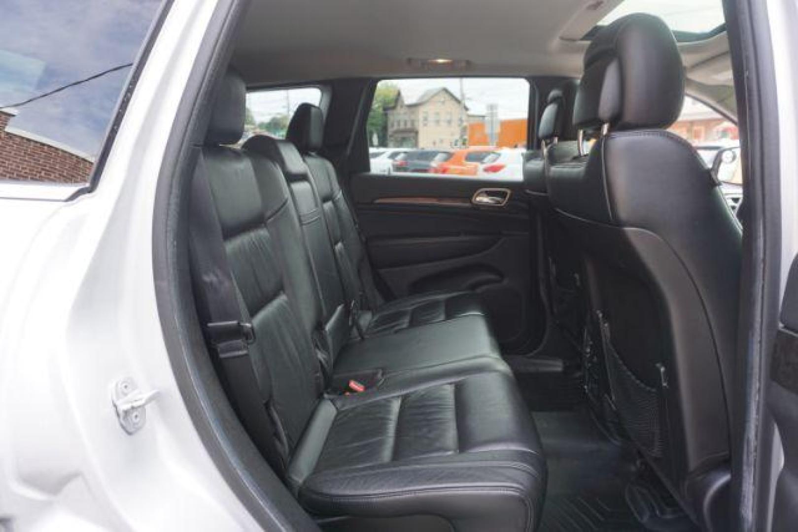 2012 Bright Silver Metallic /Black Leather Interior Jeep Grand Cherokee Laredo 4WD (1C4RJFAG2CC) with an 3.6L V6 DOHC 24V engine, 5-Speed Automatic transmission, located at 312 Centre Ave, Schuylkill Haven, PA, 17972, (570) 593-5278, 40.638130, -76.177383 - automatic climate control, back up camera, heated front seats, leather seats, navigation, power liftgate, rear parking sensors - Photo#50