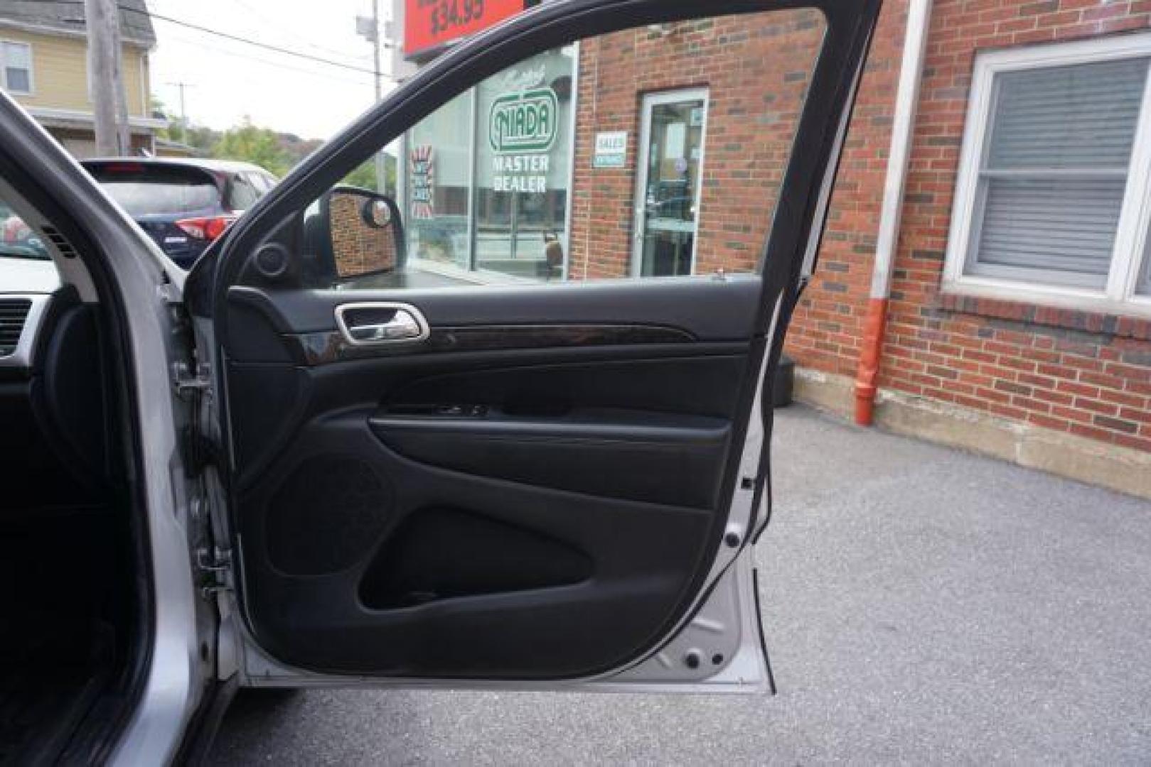 2012 Bright Silver Metallic /Black Leather Interior Jeep Grand Cherokee Laredo 4WD (1C4RJFAG2CC) with an 3.6L V6 DOHC 24V engine, 5-Speed Automatic transmission, located at 312 Centre Ave, Schuylkill Haven, PA, 17972, (570) 593-5278, 40.638130, -76.177383 - automatic climate control, back up camera, heated front seats, leather seats, navigation, power liftgate, rear parking sensors - Photo#52