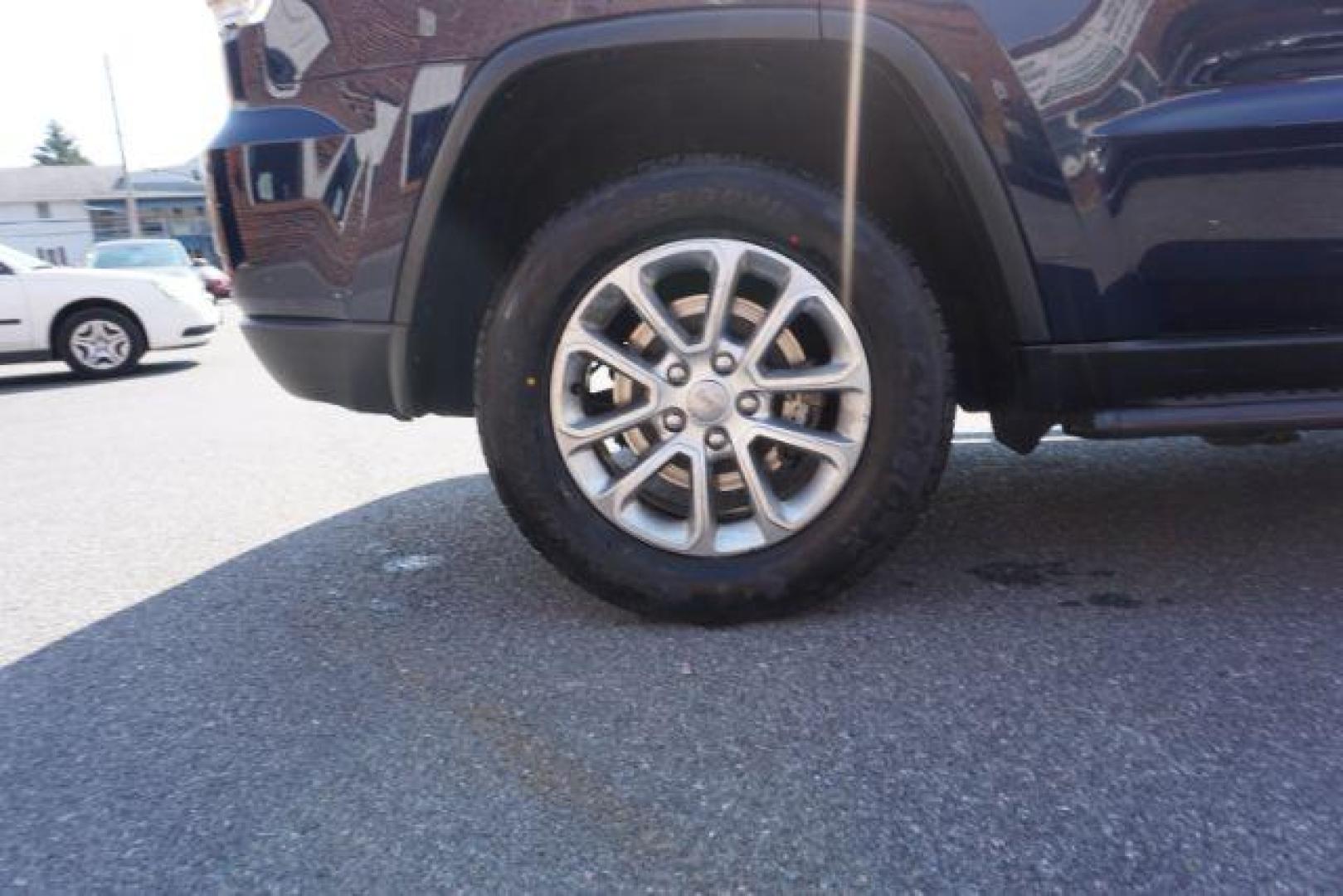 2015 True Blue Pearlcoat /Light Frost Beige/Black Jeep Grand Cherokee Limited 4WD (1C4RJFBG9FC) with an 3.6L V6 DOHC 24V engine, 8-Speed Automatic transmission, located at 312 Centre Ave, Schuylkill Haven, PA, 17972, (570) 593-5278, 40.638130, -76.177383 - adaptive cruise control, adv tech pkg, back up camera, blind spot monitor, collision avoidance system, heated front seats, lane departure warning, leather seats, navigation system, power liftgate, power sunroof, rear parking sensors, universal garage door opener - Photo#9